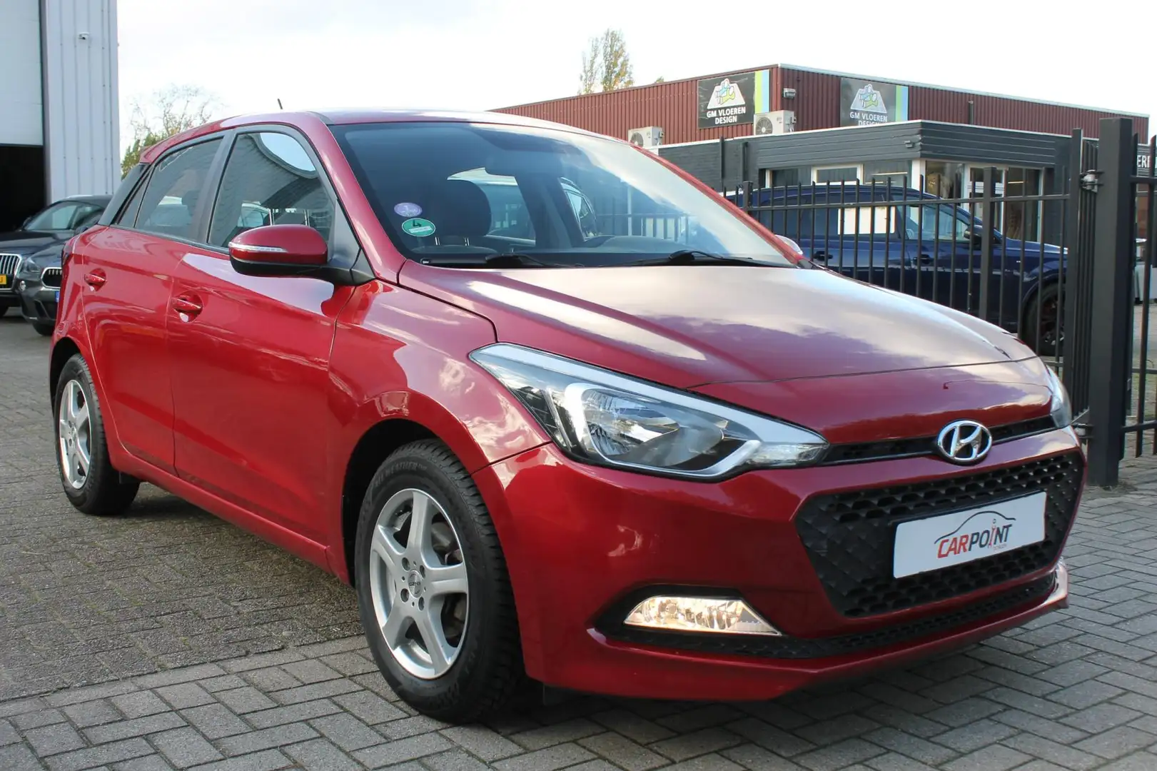 Hyundai i20 1.4i Automaat i-Motion Airco 5drs 1e Eigenaar Rouge - 2