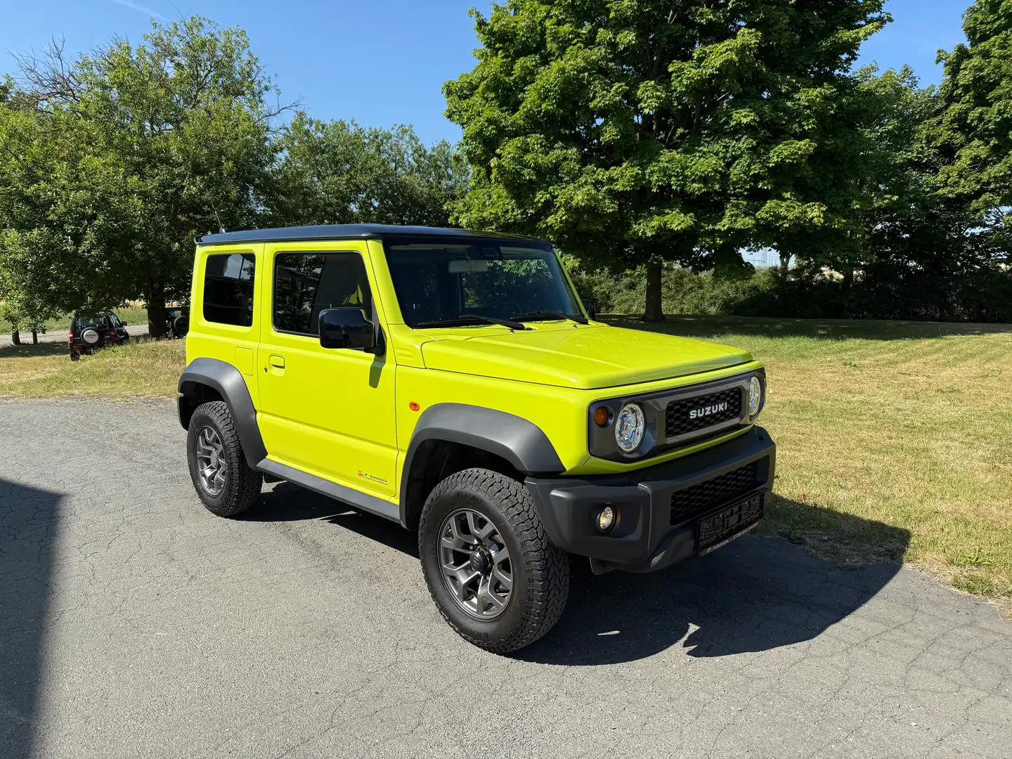 Suzuki Jimny 1.5 ALLGRIP Comfort+ AHK LED 4 Sitze 1.Hand Top Verde - 1