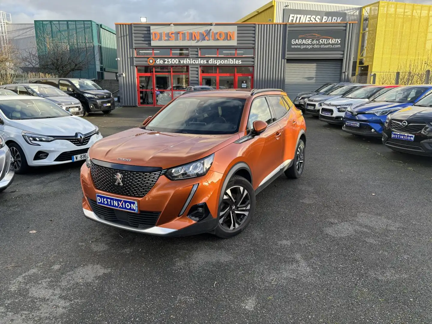 Peugeot 2008 1.2i 12V - 100 - ALLURE BUSINESS Orange - 1