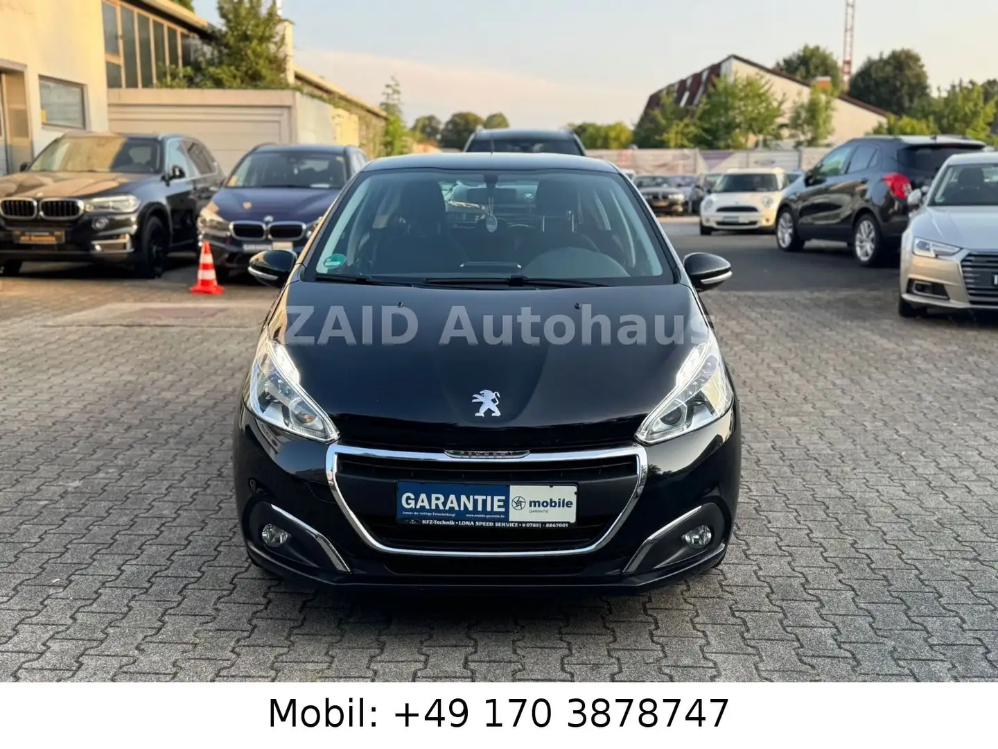 Peugeot 208 Active 1.2L 5Türig*LED*PDC*NAVI*2HAND Schwarz - 2