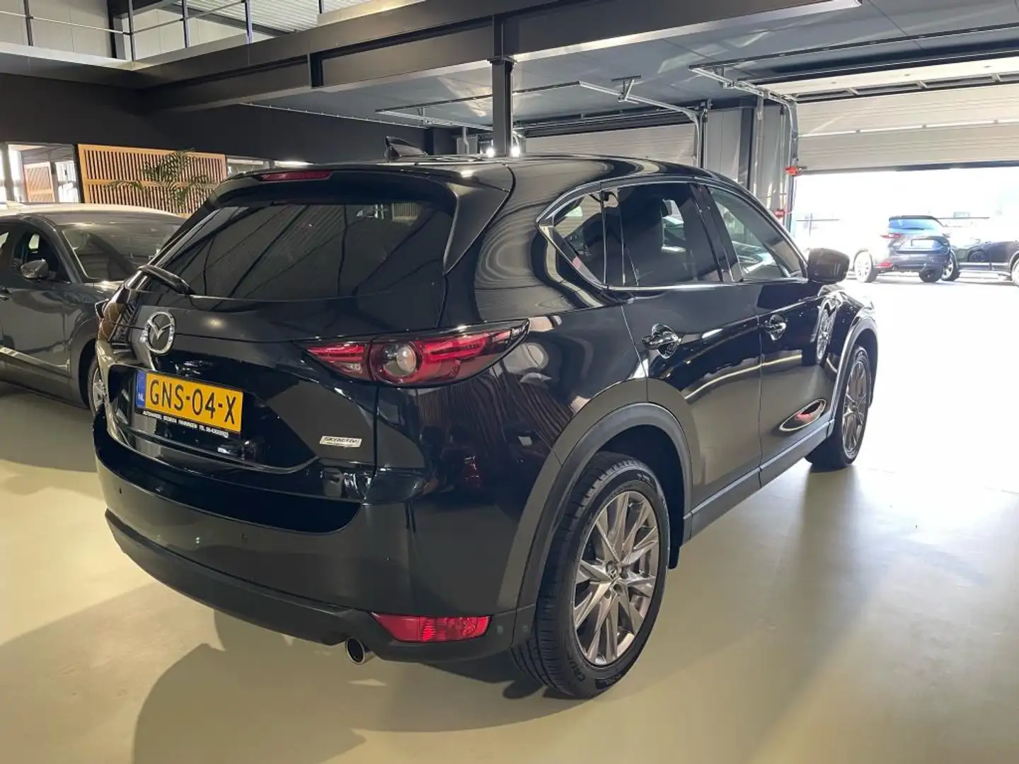 Mazda CX-5 2.5 4WD SkyActiv-G 194 Signature leder navi carpla Zwart - 2