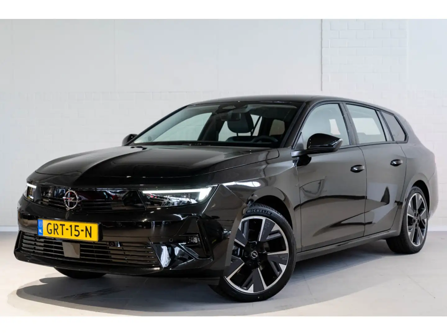 Opel Astra Electric Tourer 54 kWh Edition | Trekhaak | Apple Zwart - 1