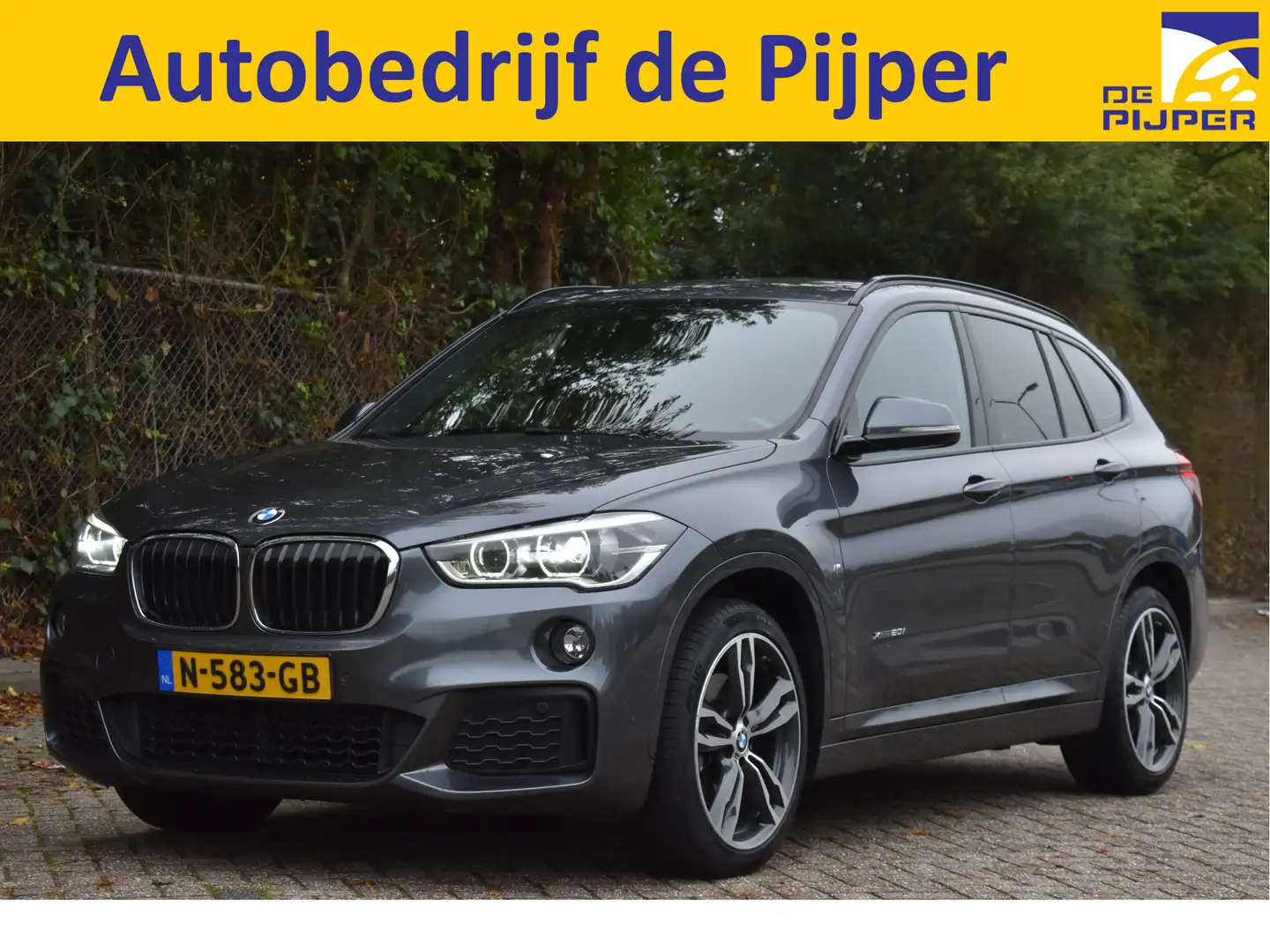BMW X1 xDrive20i High Executive 4x4 M-Sport | Sportstoele Gris - 1