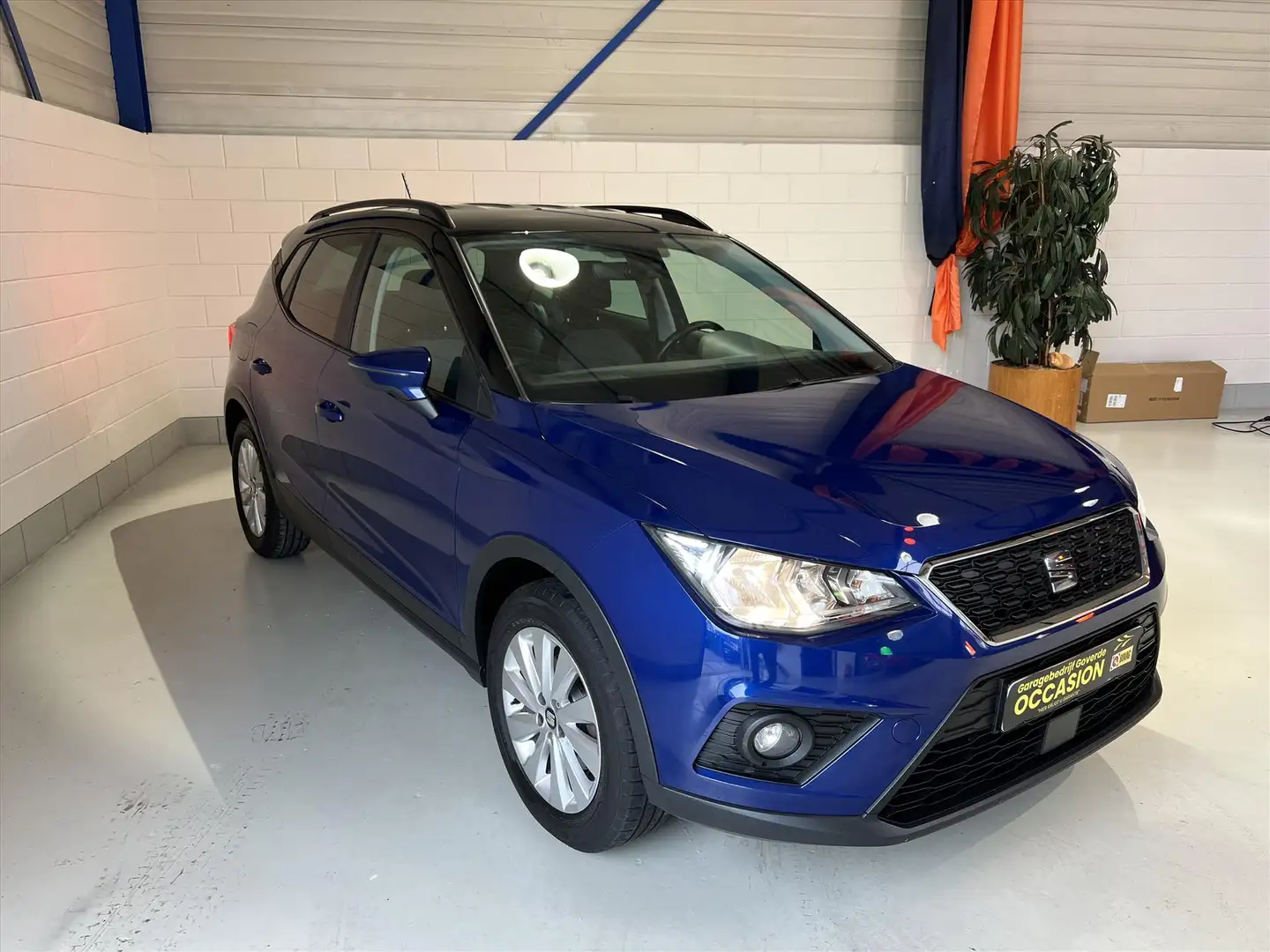 SEAT Arona 1.0 TSI 115pk Style Business Intense, 1e eig, NWST Blauw - 1