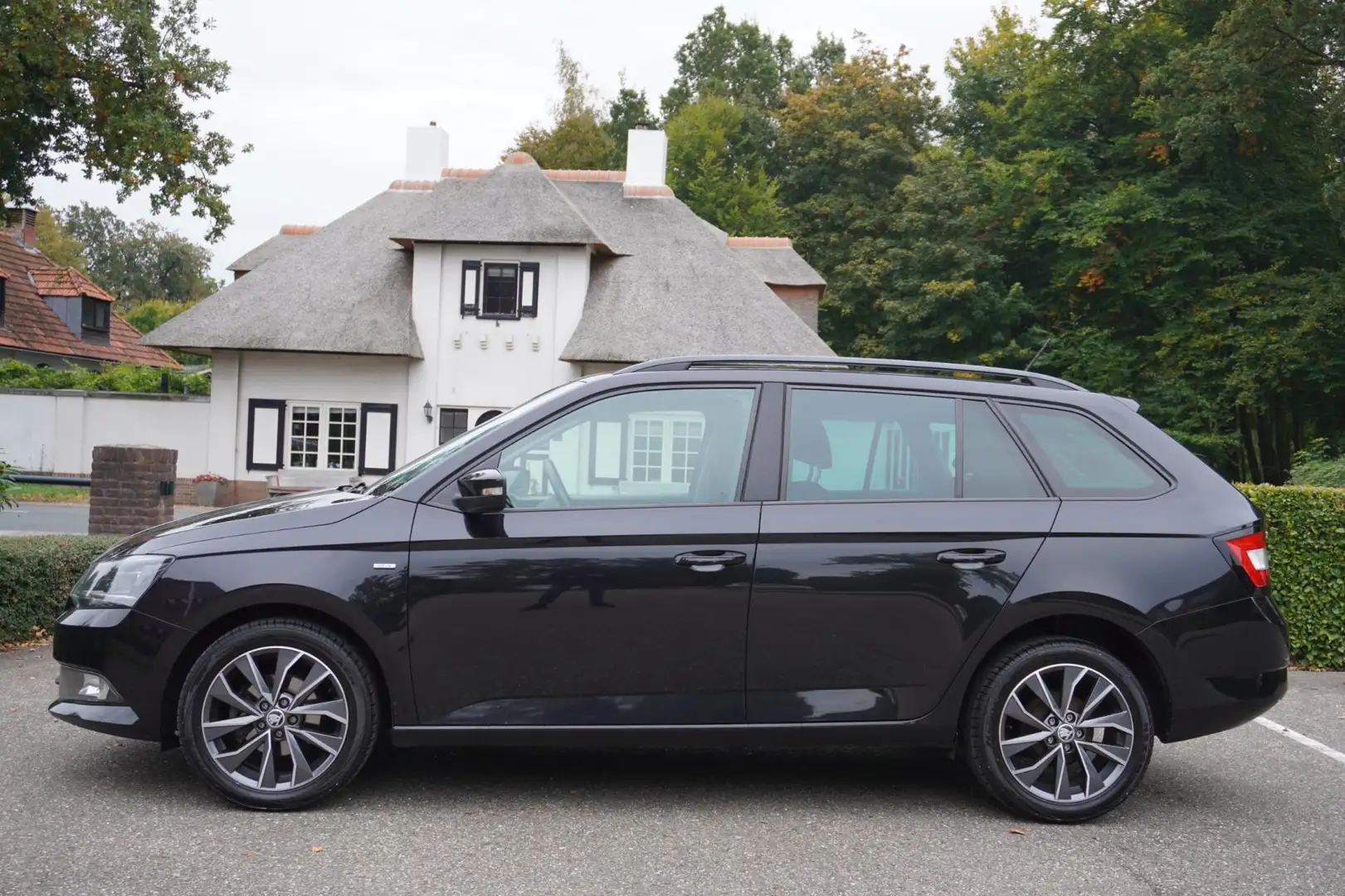 Skoda Fabia Combi 1.0 TSI Drive Airco Pdc Lm Velgen Zwart - 2