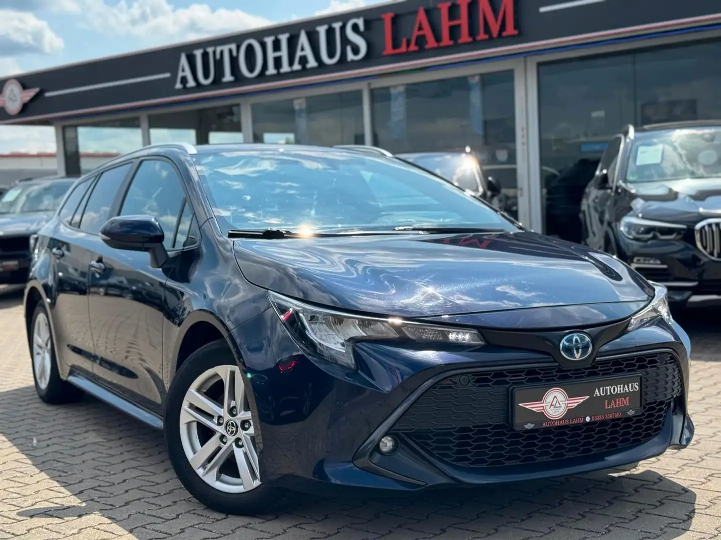 Toyota Corolla Touring Sports Hybrid Business Edition Blau - 1