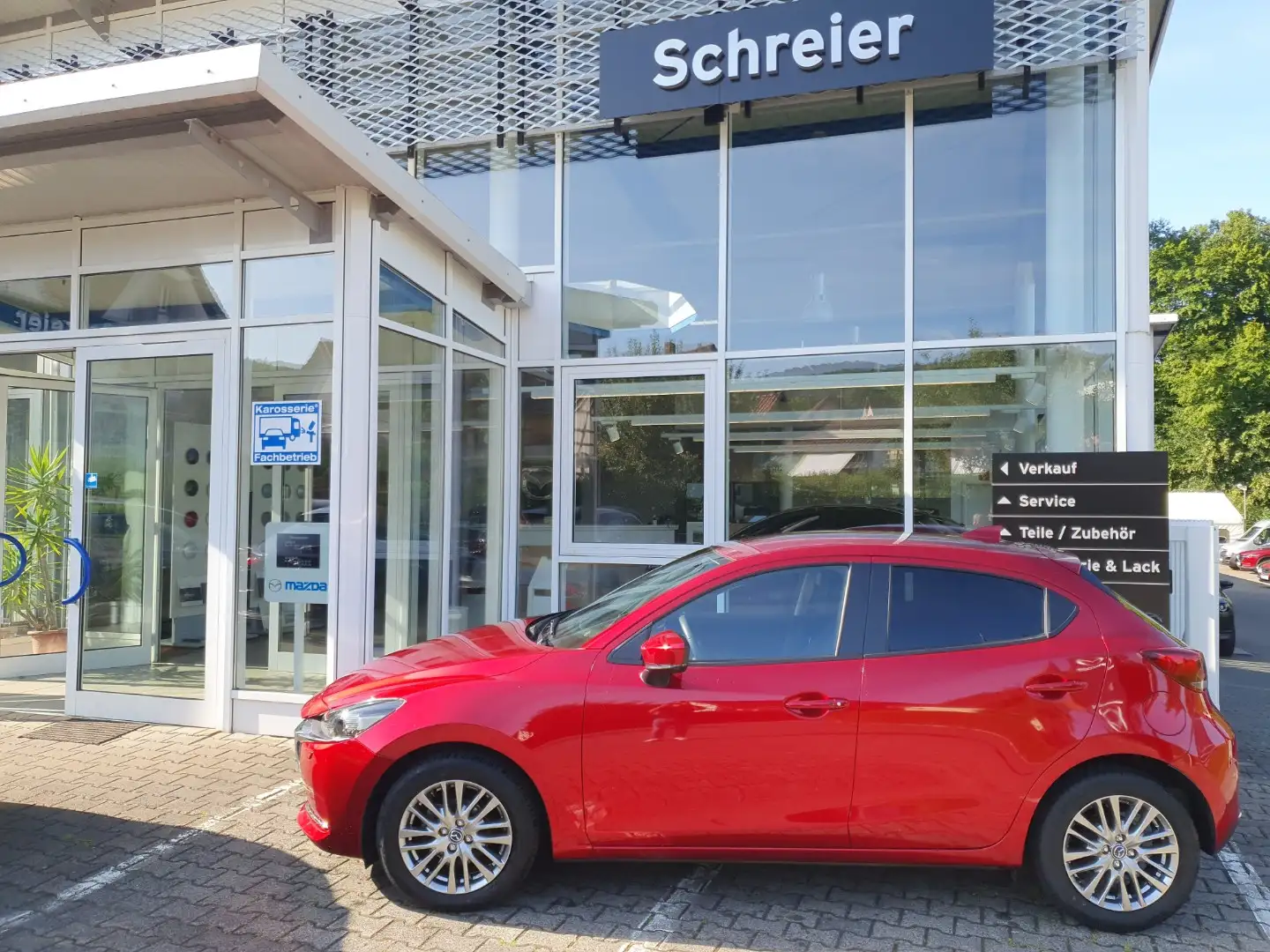 Mazda 2 Sports-Line Techn.-P. Navi 1.Hand Garantie Rojo - 1