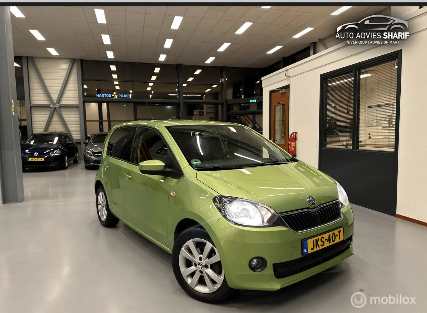 Skoda Citigo 1.0 Elegance Airco|Cruise|PDC|Stoelverw.|NewAPK Groen - 1