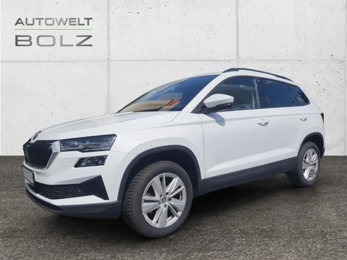 Skoda Karoq Selection 1.5 TSI AHK Navi Matrix Kamera DigiCock Weiß - 1