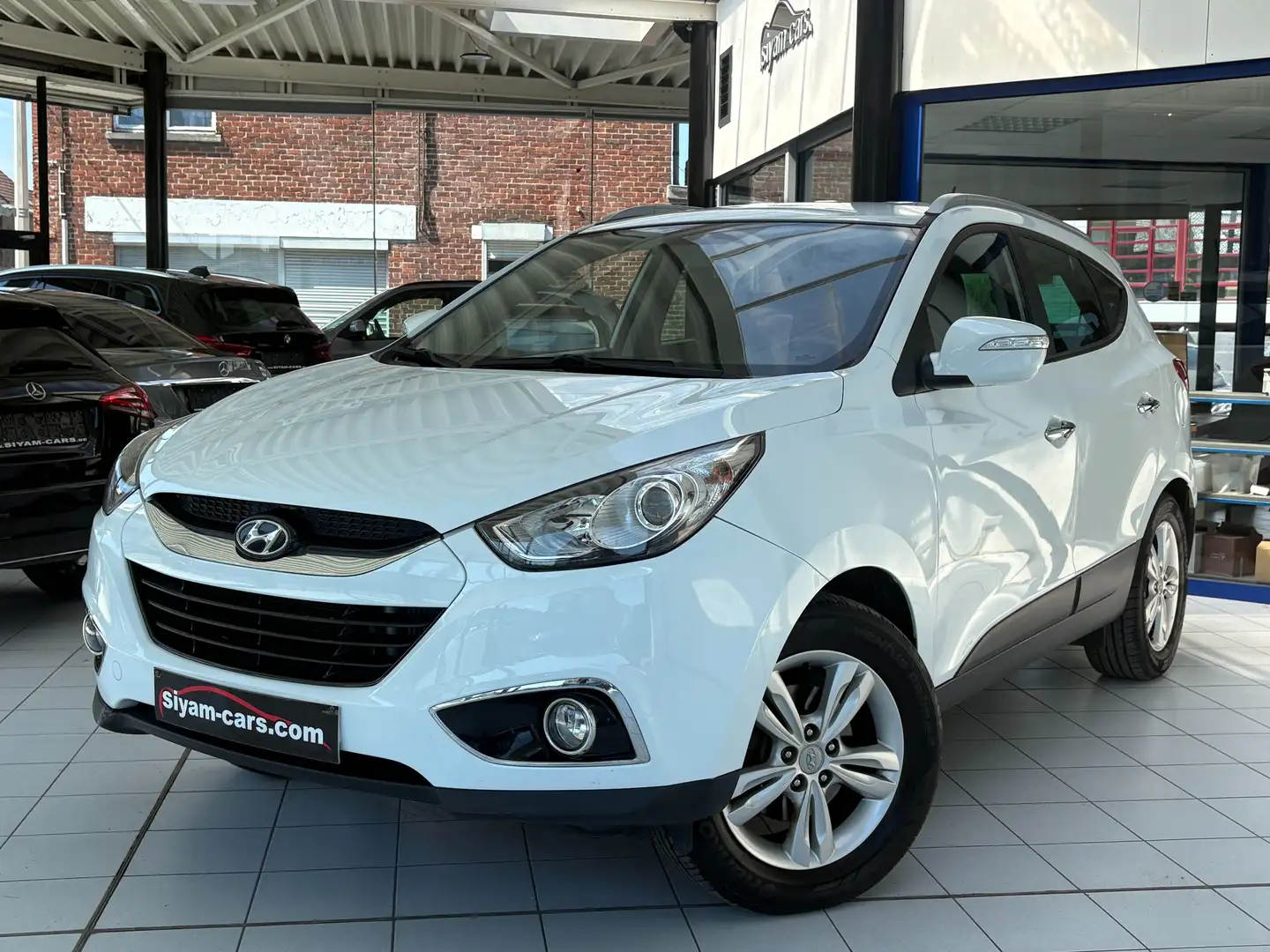Hyundai iX35 iX35 2.0 CRDi *CUIR * GPS * CAMERA * PDC * JANTES* Wit - 1