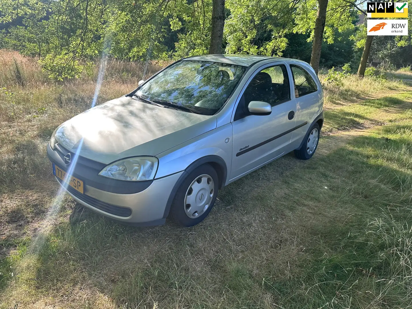 Opel Corsa 1.2-16V Comfort apk t/m 04-07-2026 Grijs - 1