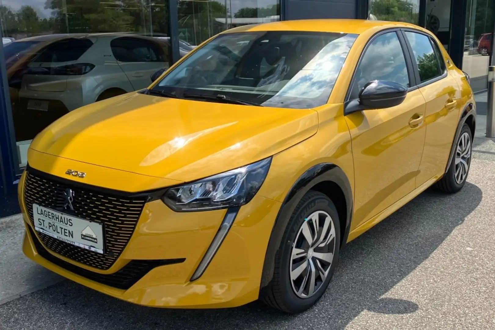 Peugeot e-208 ACT PK Gelb - 1