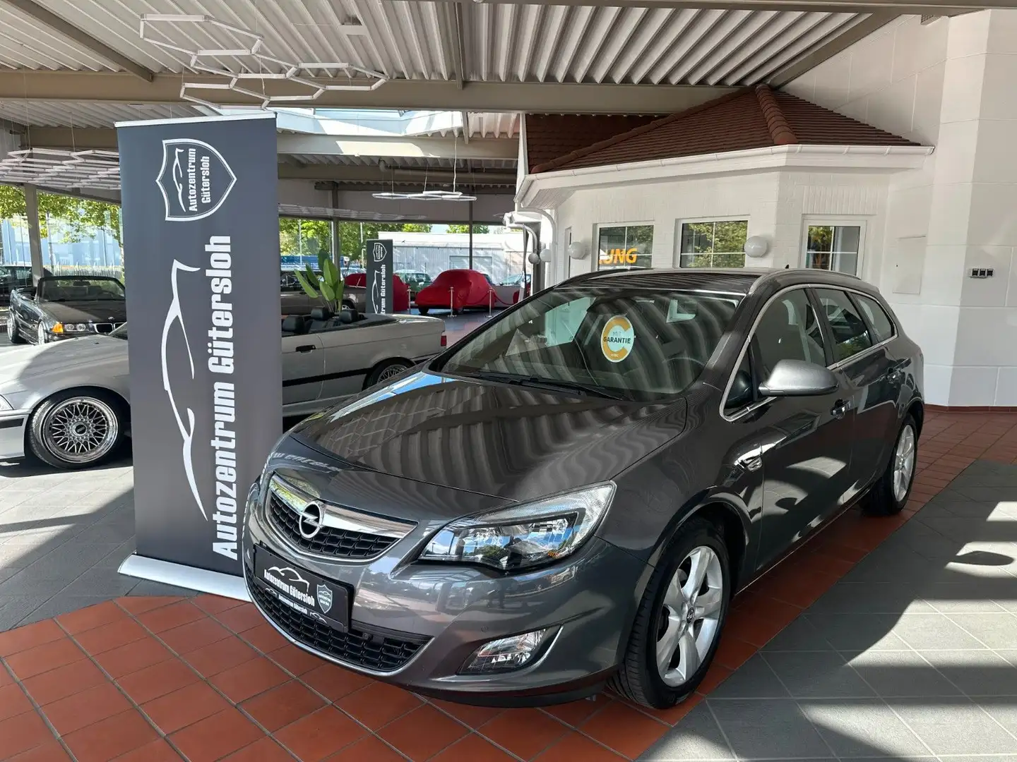 Opel Astra J Sports Tourer Sport *2.Hand/ Garantie * Grijs - 1