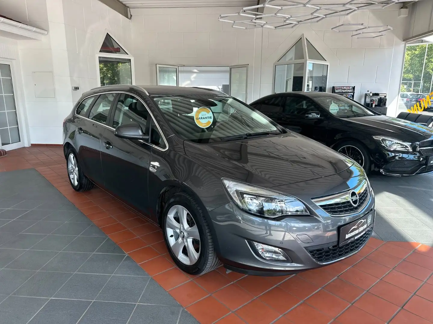 Opel Astra J Sports Tourer Sport *2.Hand/ Garantie * Grijs - 2