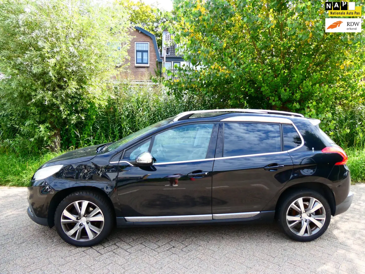 Peugeot 2008 1.6 VTi 120pk Clima Navi Pano LEES TEKST HANDEL EX Schwarz - 1