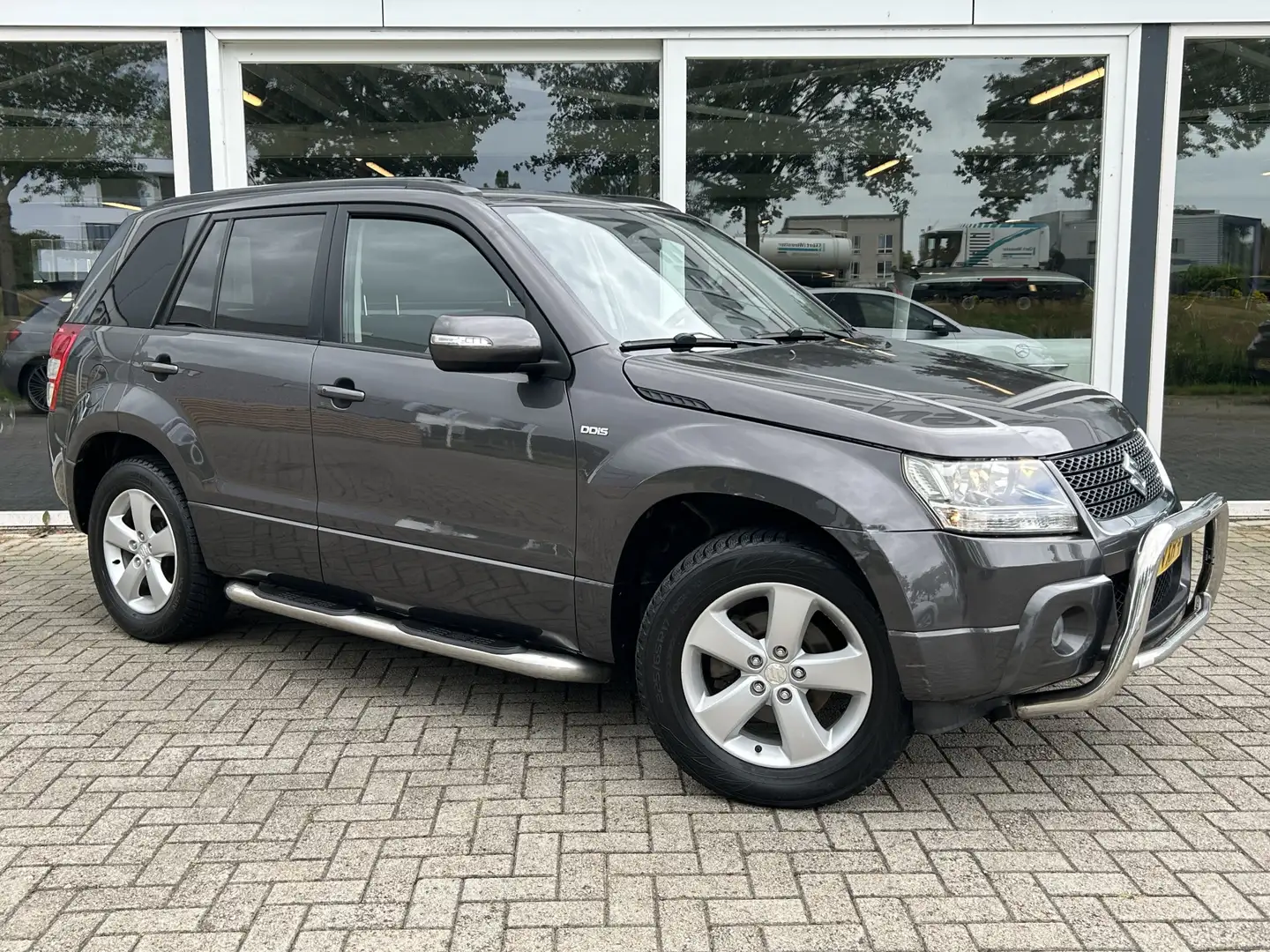 Suzuki Grand Vitara 1.9 Exclusive Trekhaak / Keyless / Clima / Stoelve - 1