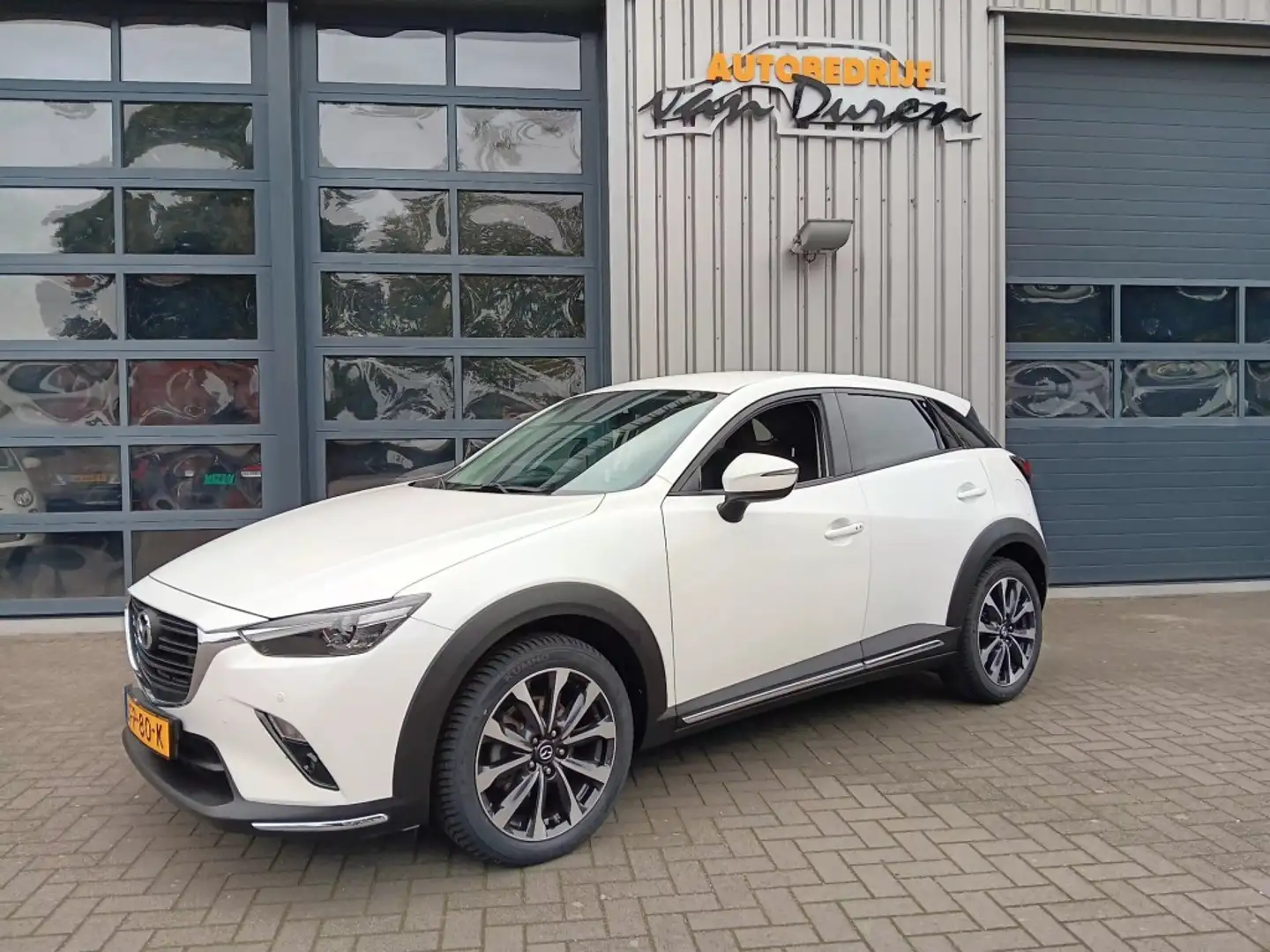 Mazda CX-3 2.0 Skyactiv-G 120 GTM Clima/Cruise PDC v+a AUR Wit - 1