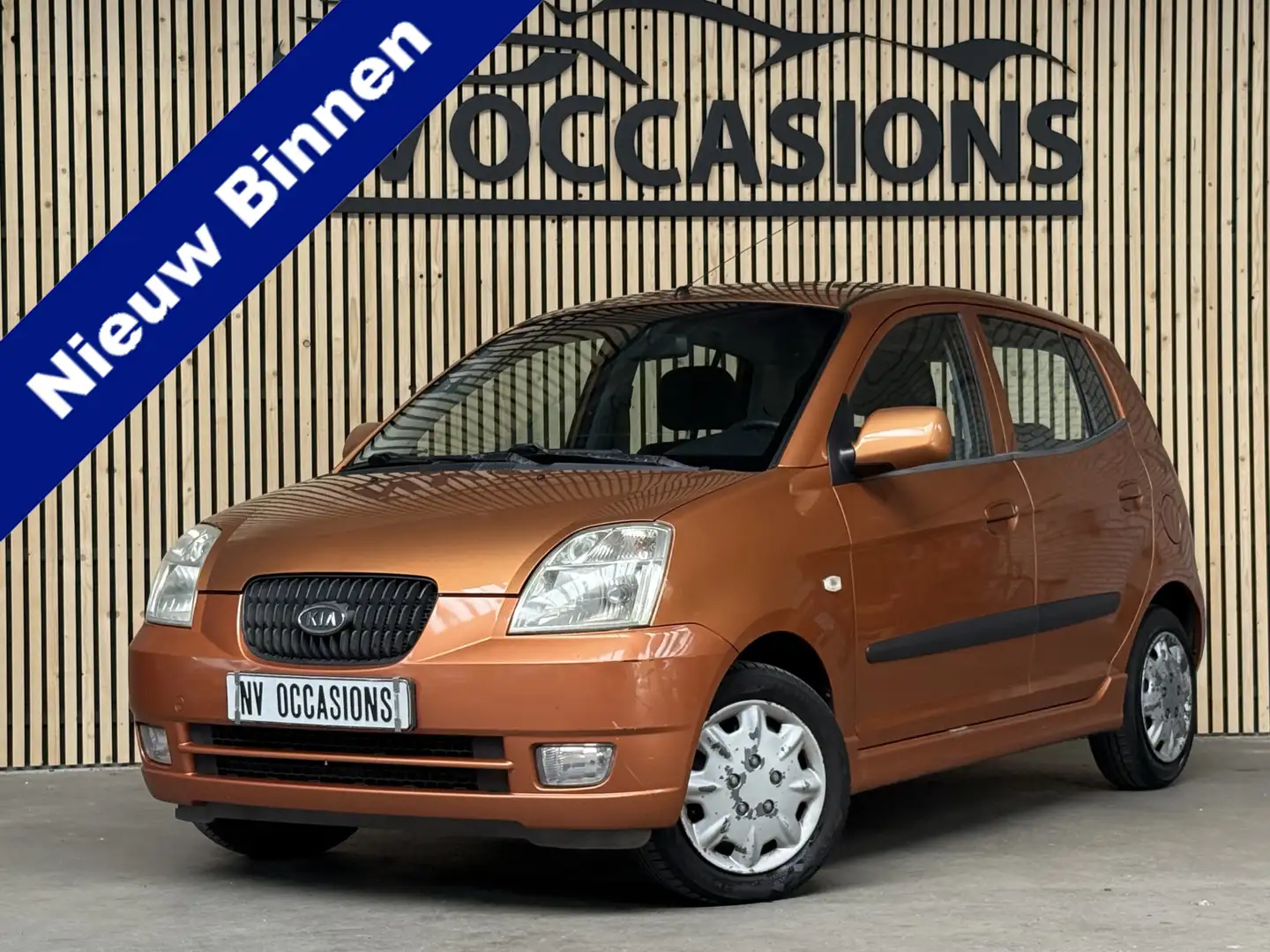 Kia Picanto 1.0 LXE X-tra NIEUWE APK 15-08-2026/5DRS/TRKHAAK/I Oranje - 1