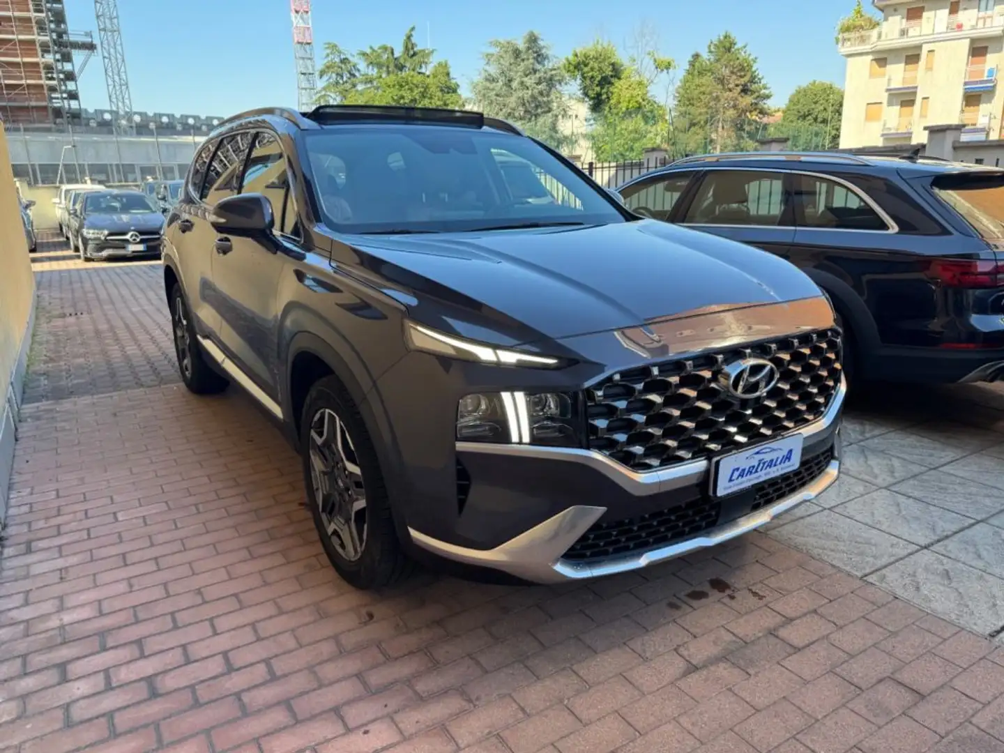 Hyundai SANTA FE 1.6 T-GDI HEV 4WD AT 7p. 20th Anniv. TETTO PANORAM Grigio - 1