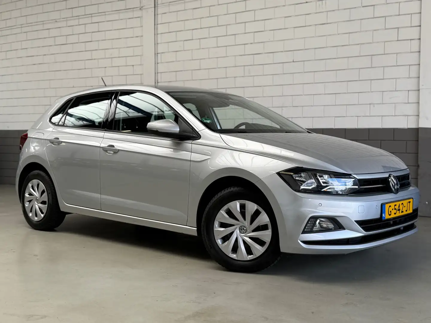 Volkswagen Polo 1.0 TSI Comfortline Automaat Zilver - 1