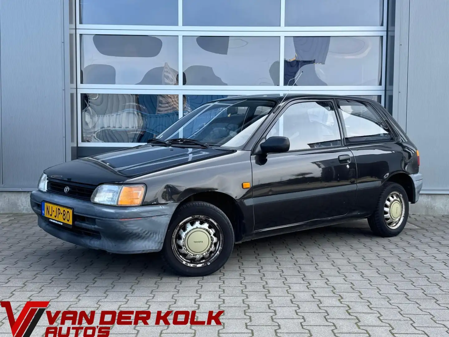 Toyota Starlet 1.3 XLi Comfort | 2 Jaar APK | Stuurbekrachtiging Schwarz - 1