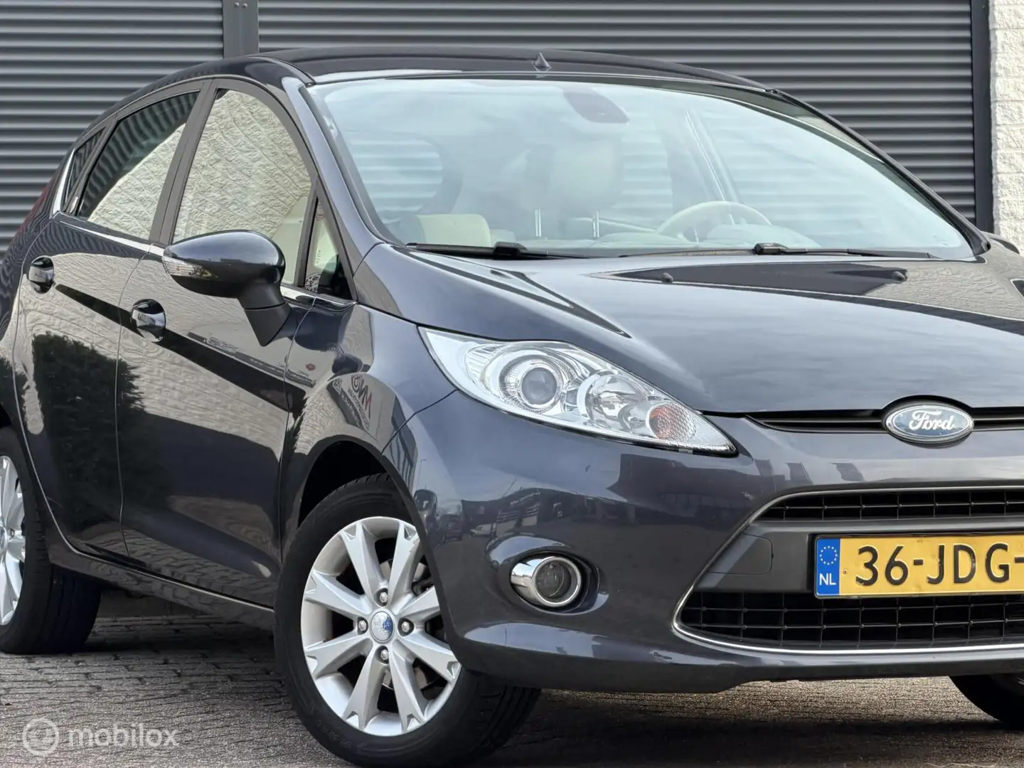 Ford Fiesta 1.25 Ghia|NAP|APK|AIRCO|ELEKPAKKET Grijs - 2