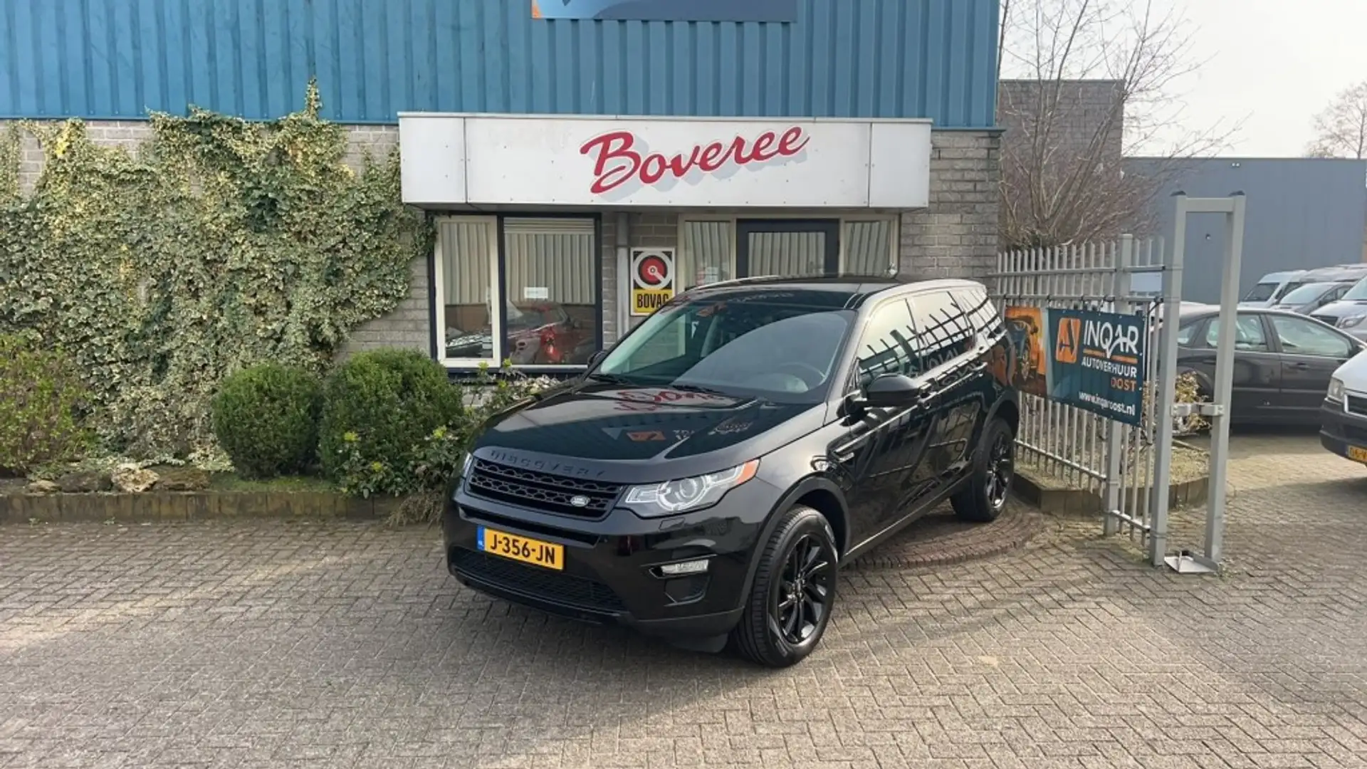 Land Rover Discovery Sport 2.0 SI4 4WD HSE 7 Persoons Zwart - 1