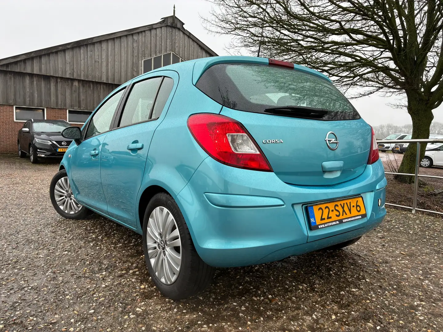Opel Corsa 1.4-16V Cosmo | 5-Deurs + Cruise + Clima nu €3.975 Blau - 2