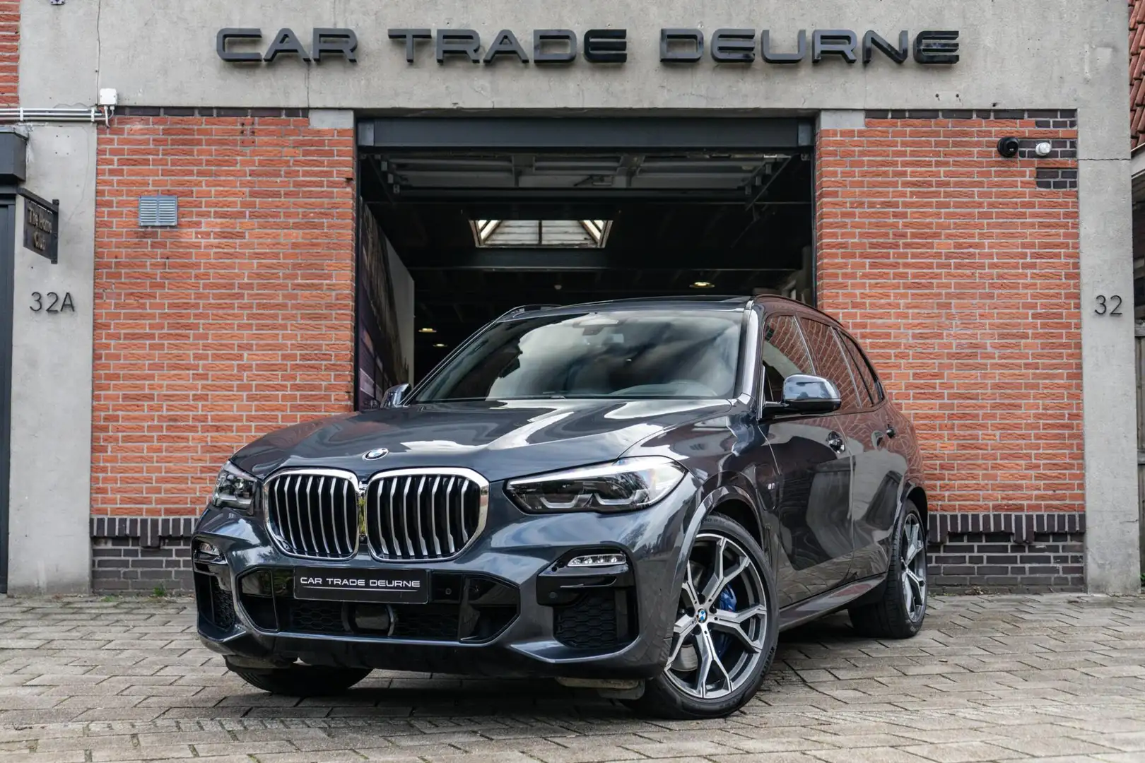BMW X5 xDrive45e M-Sport Pano / HUD / Softclose Grijs - 1