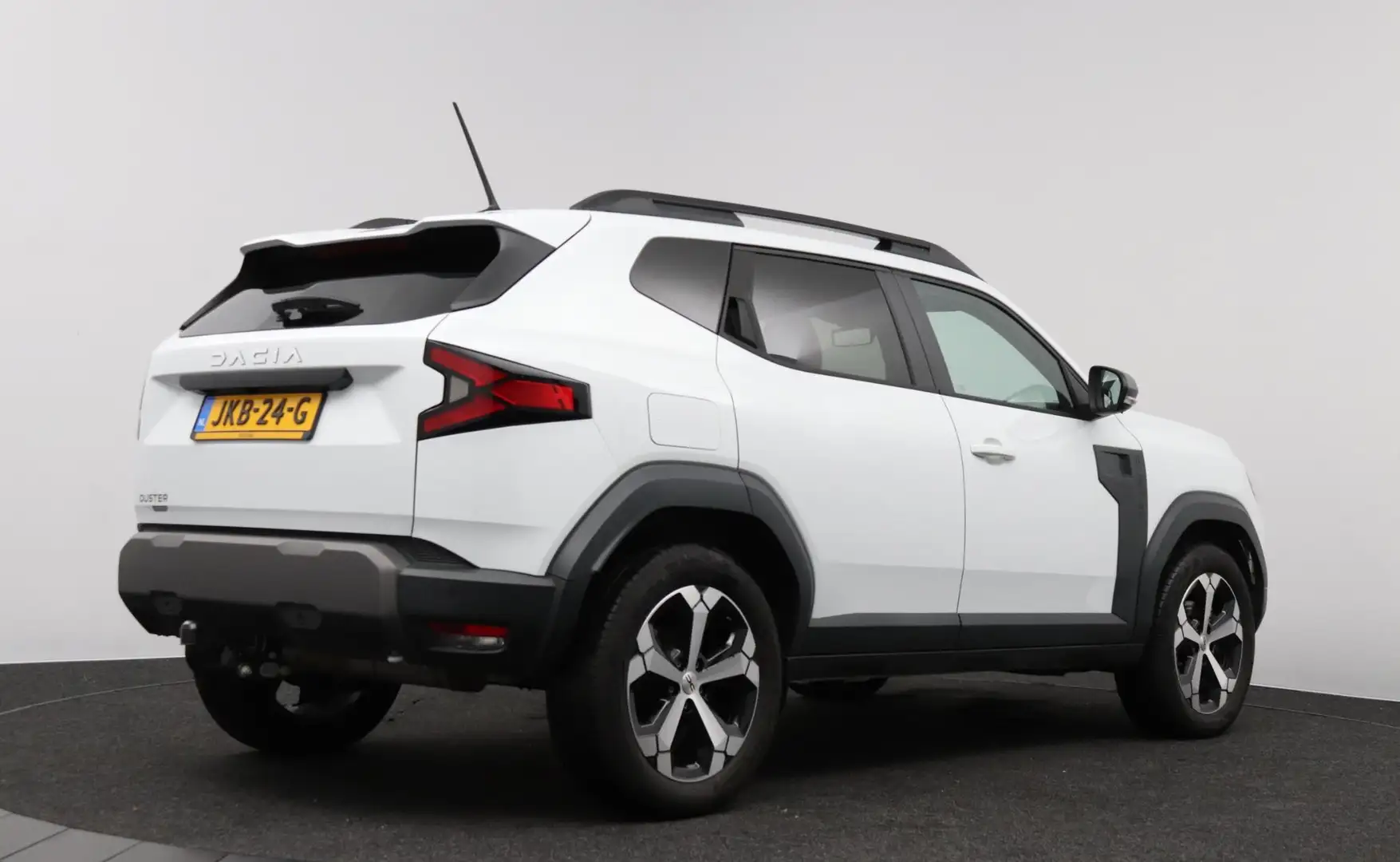 Dacia Duster 1.6 Hybrid 140 Journey | Pack Winter | Trekhaak | Wit - 2