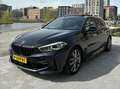 BMW 118 BMW 1-serie 118d High Executive M Sport Pack/Pano Zwart - thumbnail 1