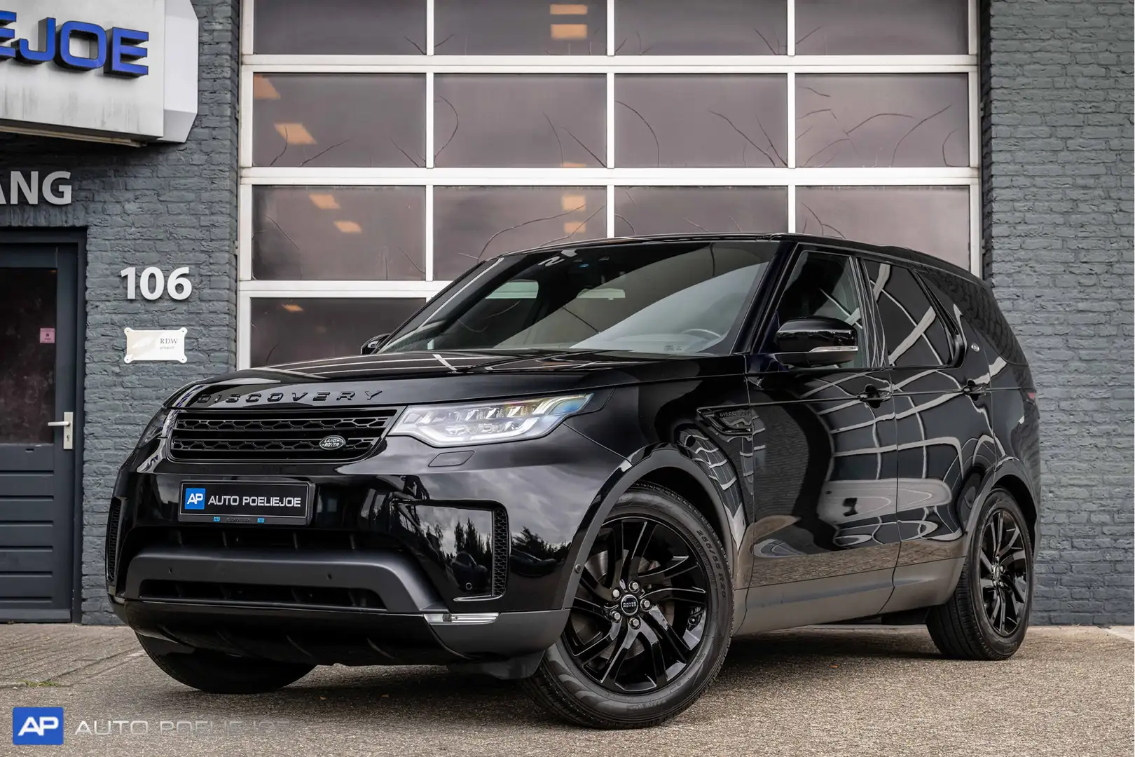 Land Rover Discovery 2.0 Si4 HSE Luxury 7p. Pano, Leder, Lucht/V, LM20, Zwart - 1