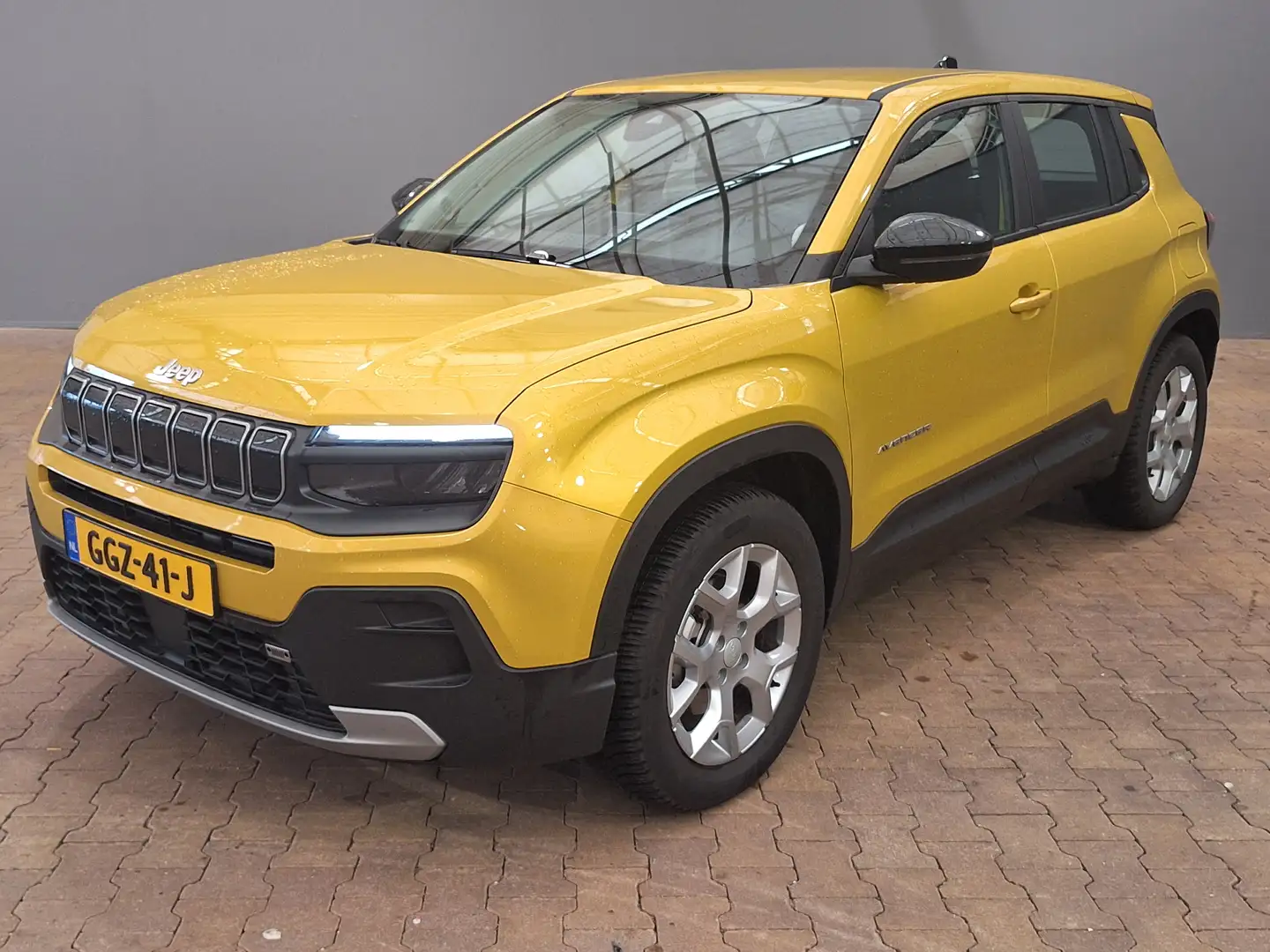 Jeep Avenger Altitude 54 kWh Navigatie | Keyless | Elektrische Geel - 1