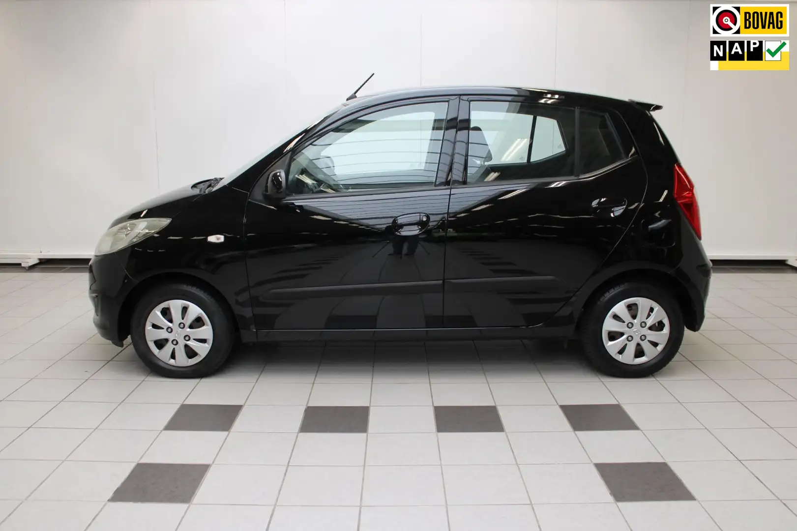Hyundai i10 1.1 i-Drive Cool - Airco, NAP en Lage KM-stand Zwart - 1