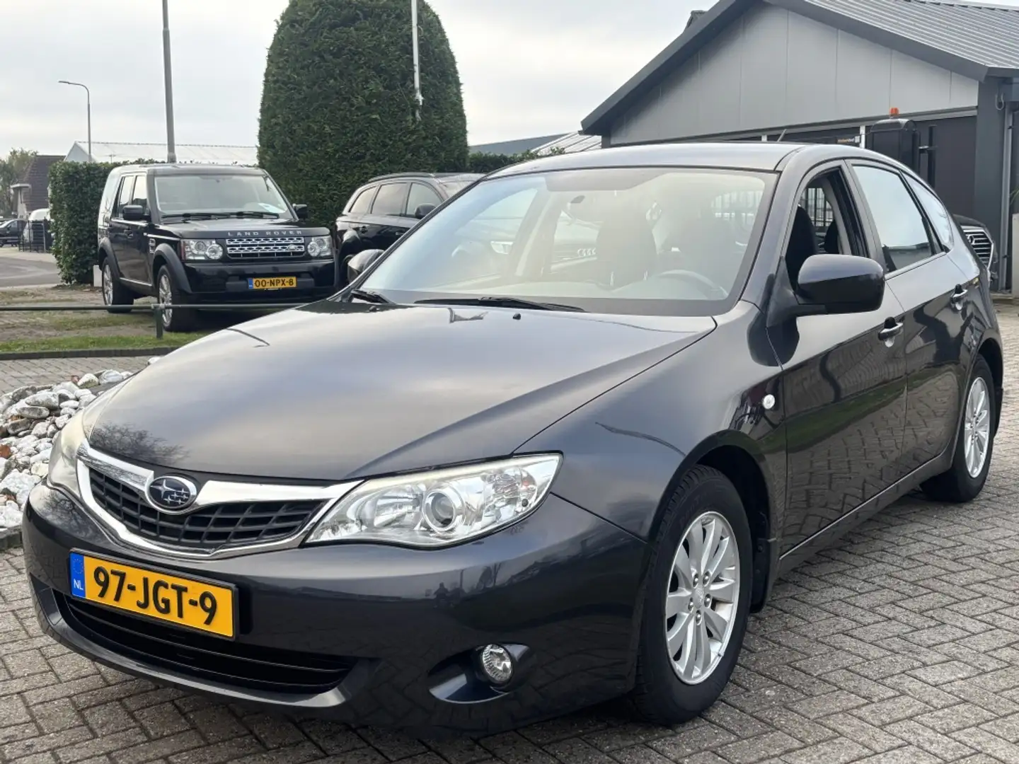 Subaru Impreza 1.5R Luxury Benzine 2009 Youngtimer Gris - 1