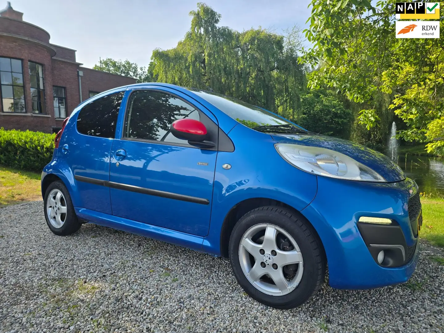 Peugeot 107 1.0 Sportium 5-deurs AIRCO *apk:01-2026* Blau - 1