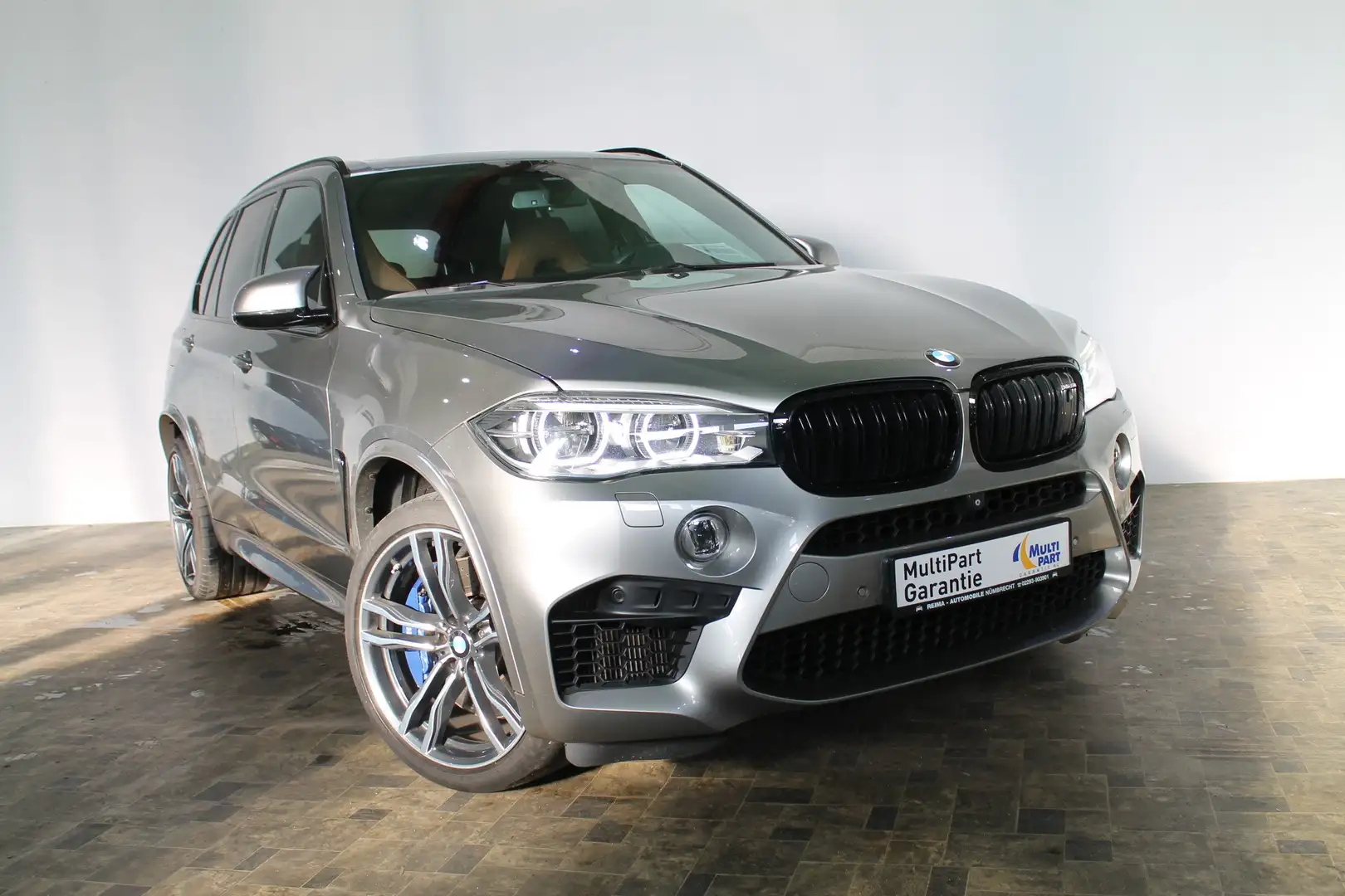 BMW X5 M pano, LED, 360°, B&O, HUD Grijs - 1