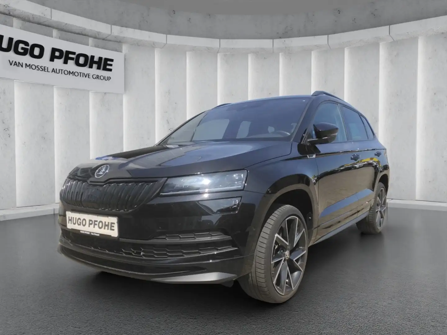 Skoda Karoq 1.5 TSI ACT Sportline OPF (EURO 6d) Zwart - 1