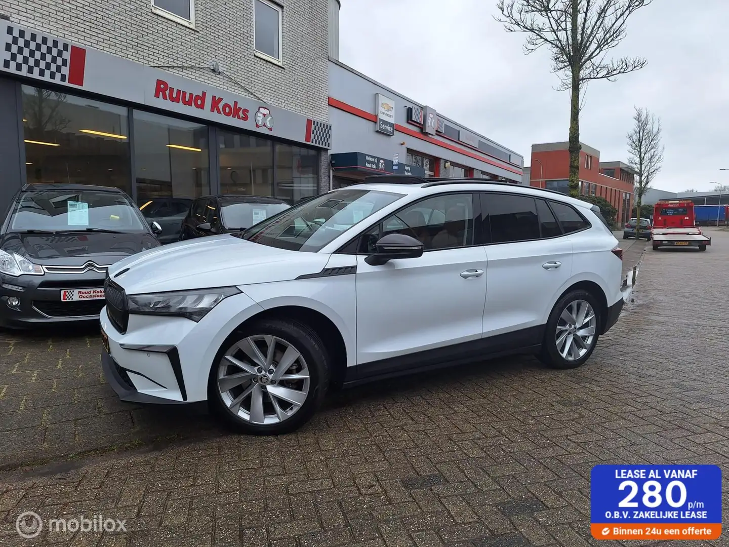 Skoda Enyaq iV 60 / Panoramadak / Trekhaak / Weiß - 1