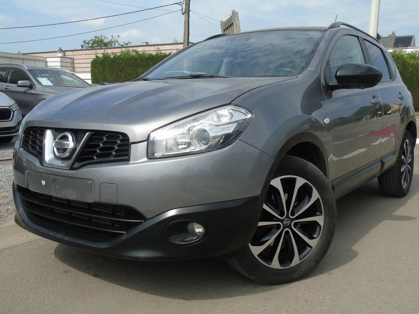 Nissan Qashqai 1.6 dCi 2WD Pure-Drive *Ohboek*Navi*Camera*EURO 5 Grijs - 1