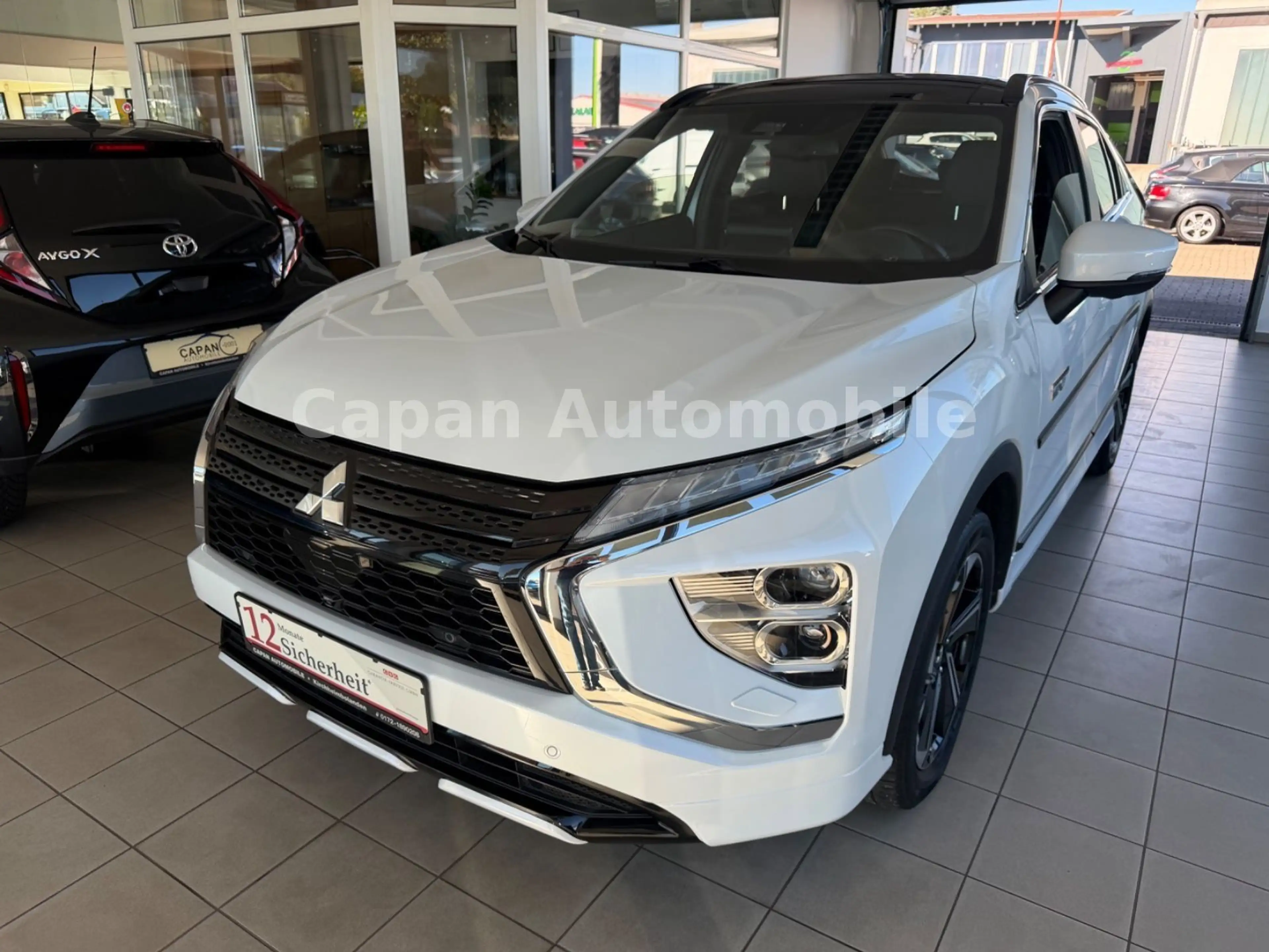 Mitsubishi Eclipse Cross Top Hybrid 4WD Scheckheft/360°/AHK — photo 3
