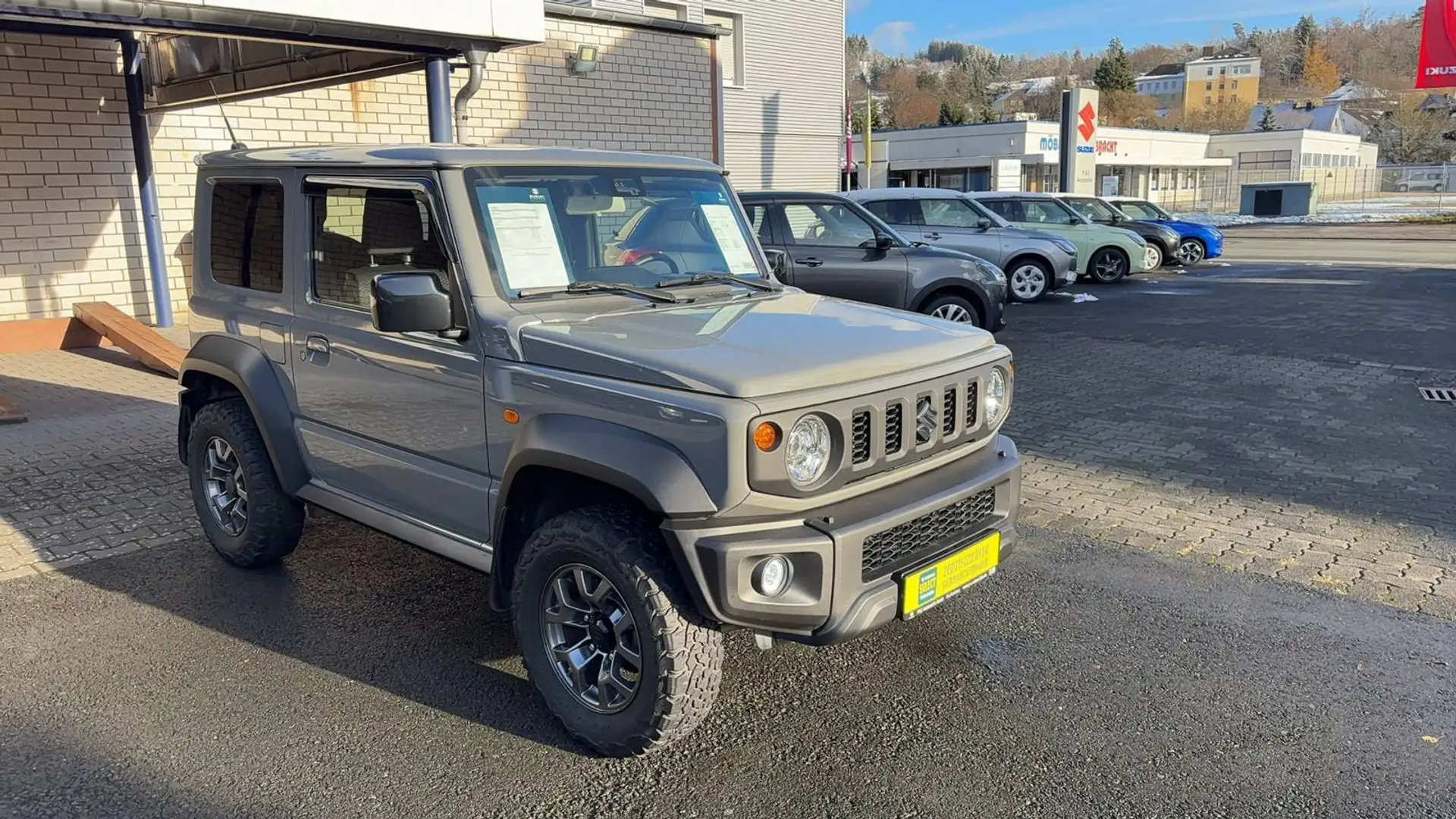 Suzuki Jimny 1.5 ALLGRIP Comfort+ 4 Sitzer*AHK*Navi* Gris - 1