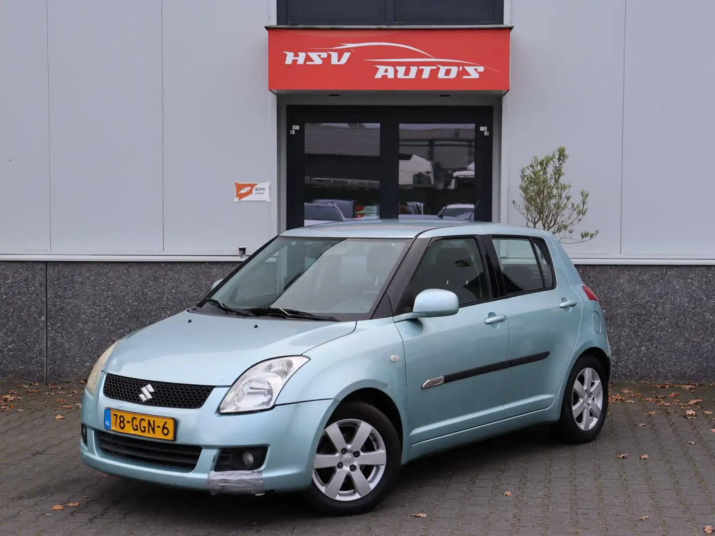 Suzuki Swift 1.3 Shogun airco LM 4-deurs Blauw - 1