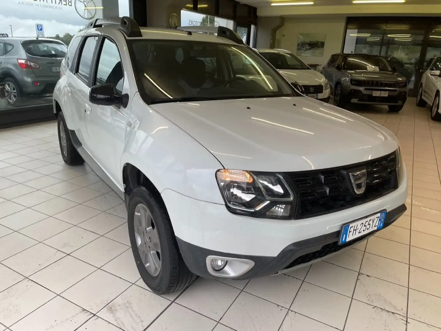 Dacia Duster Duster I 2014 1.5 dci Laureate Family 4x4 s Weiß - 1
