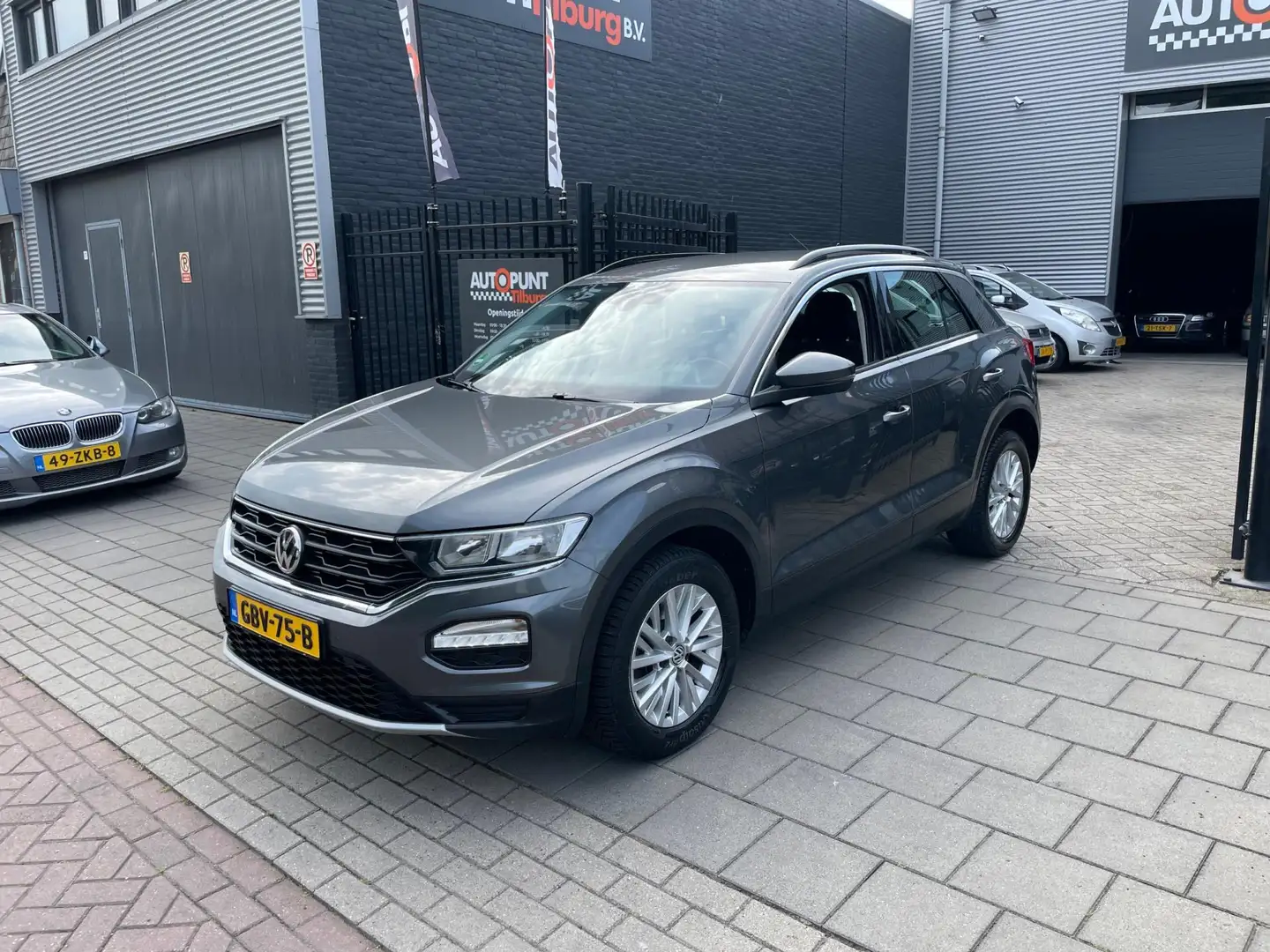 Volkswagen T-Roc 1.0 TSI Airco Navi PDC NAP APK Grijs - 1