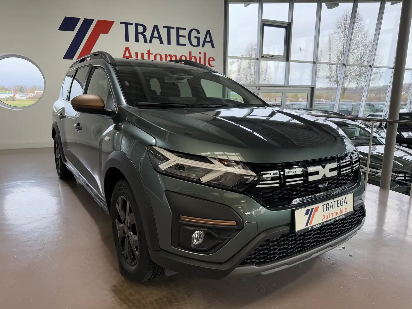 Dacia Jogger Hybrid 140 Autom Extreme 7-Sitzer Navi SH Grün - 1