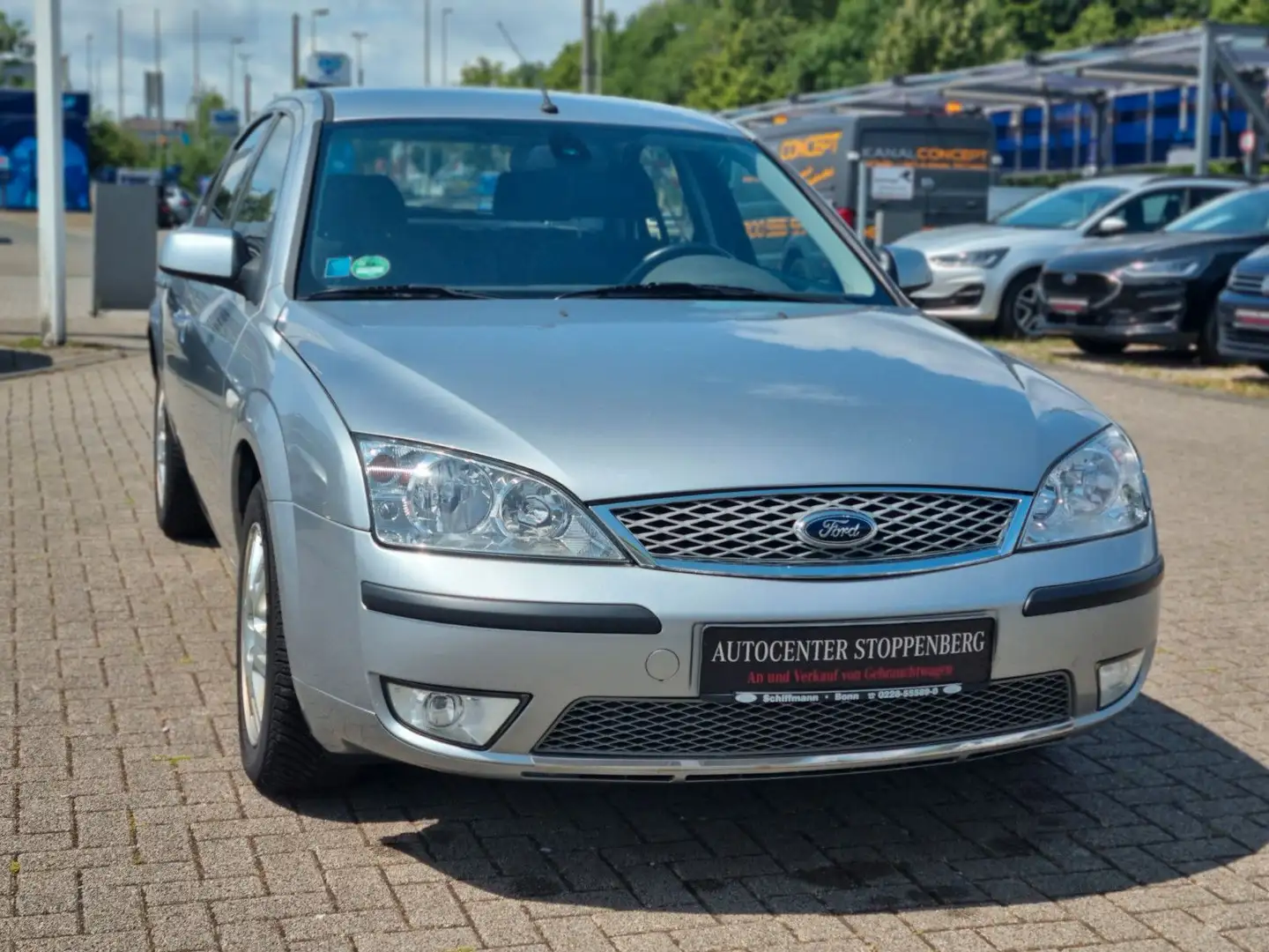 Ford Mondeo Lim. Ghia/Navi/PDC/Garantie/1.Hand/SHZ/FZ Argent - 1
