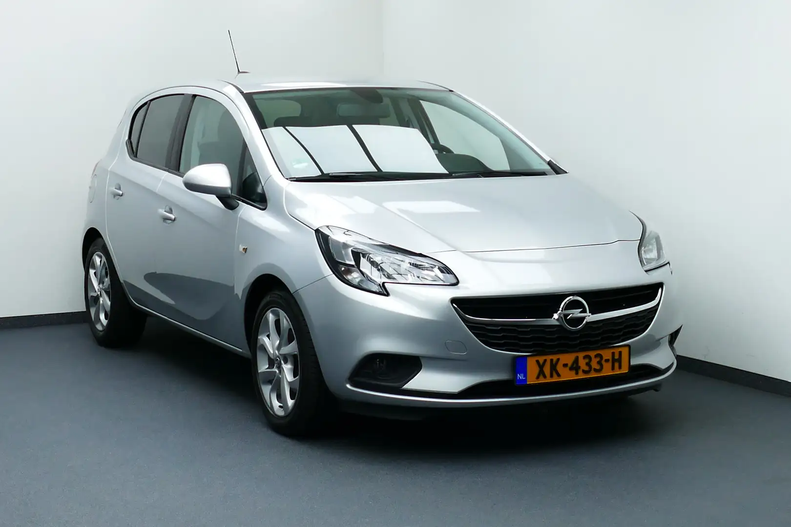 Opel Corsa 1.4 4-Cil Online Edition. Bj 2019 62.000Km. Carpla Grijs - 1