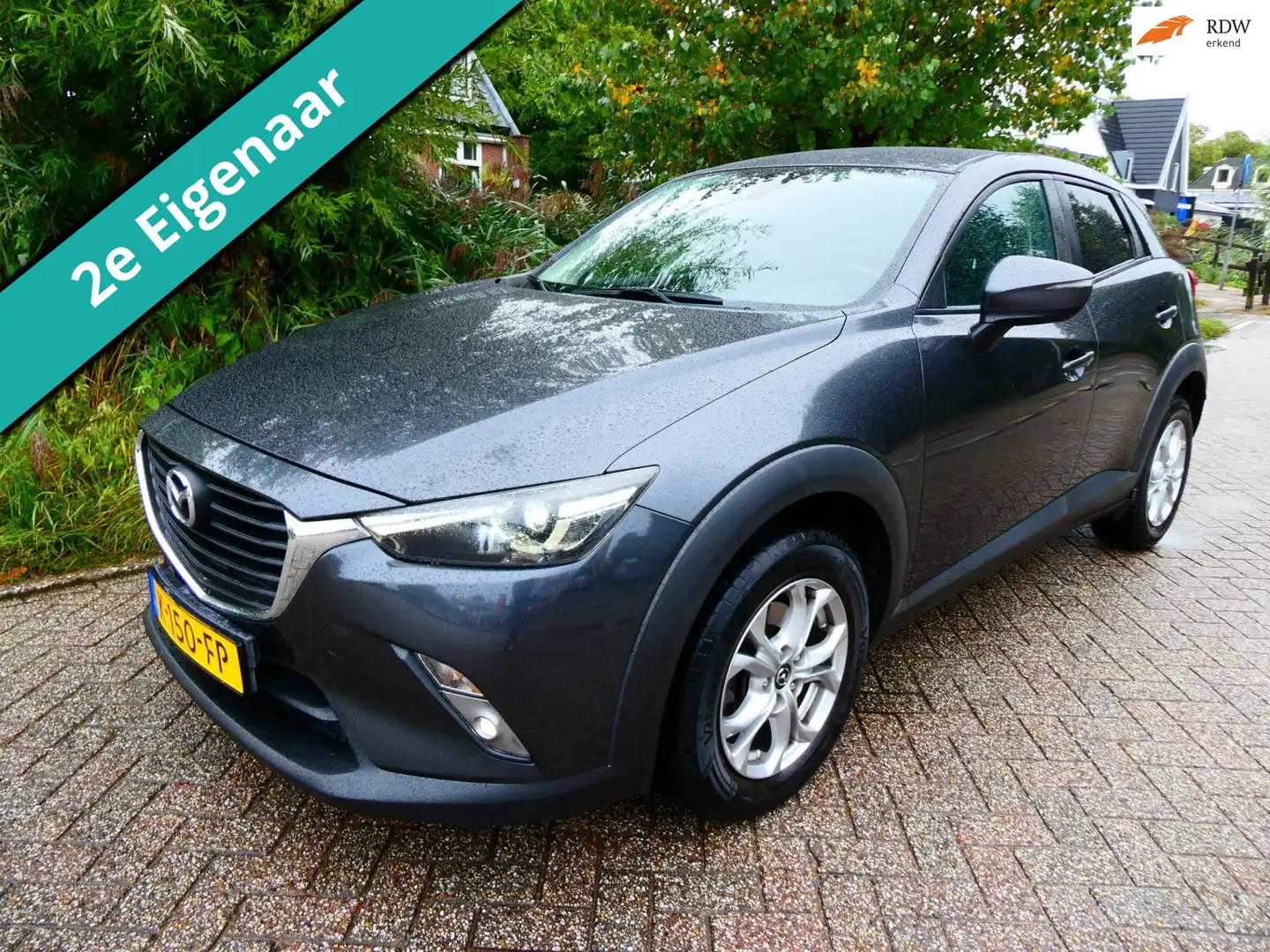 Mazda CX-3 2.0 SkyActiv-G 120 TS 2e eigenaar Clima Cruise Nav Grijs - 1