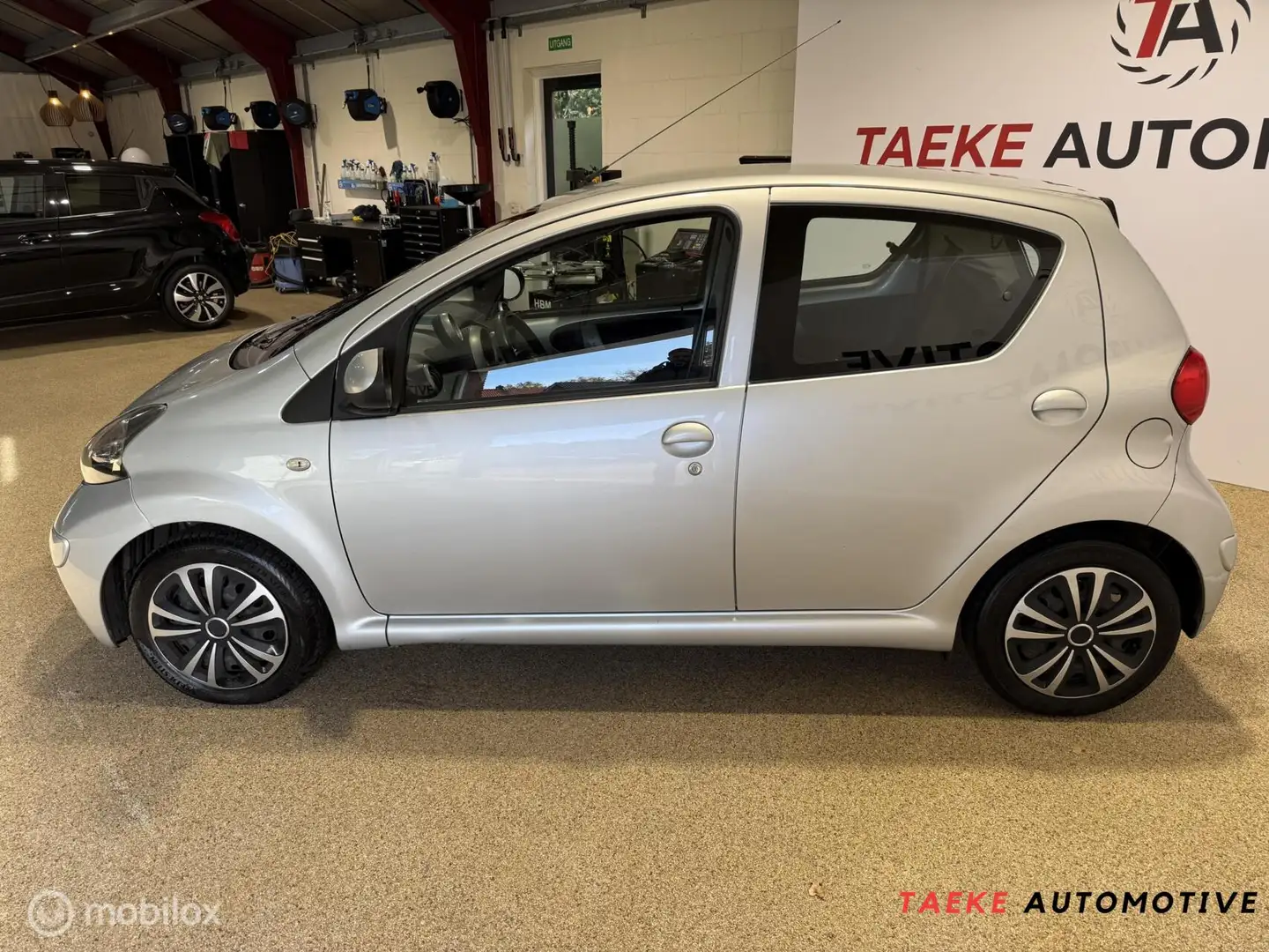 Toyota Aygo 1.0-12V + Airco/Apk Gris - 2